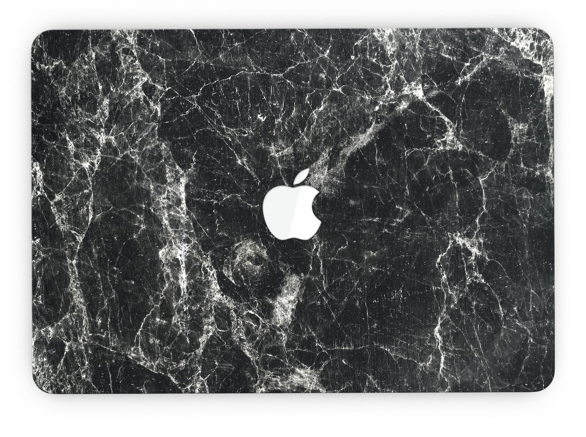 Marble-patterned laptop with Apple logo.