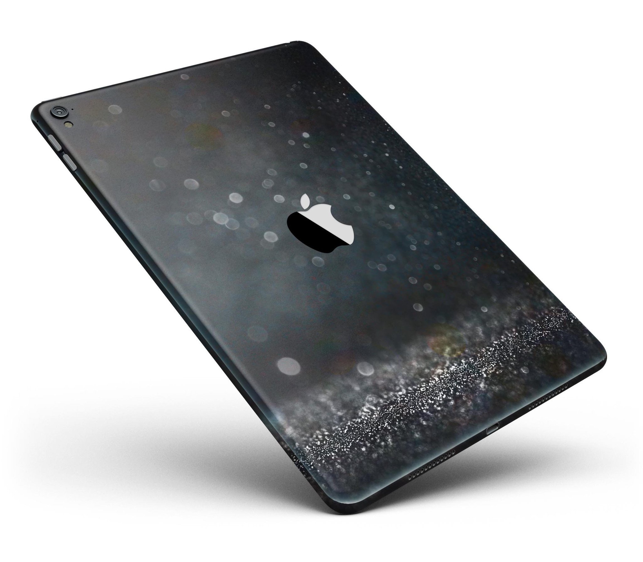 Black Unfocused Glowing Shimmer Full Body Skin for iPad Pro, showcasing its sleek design and premium vinyl material.