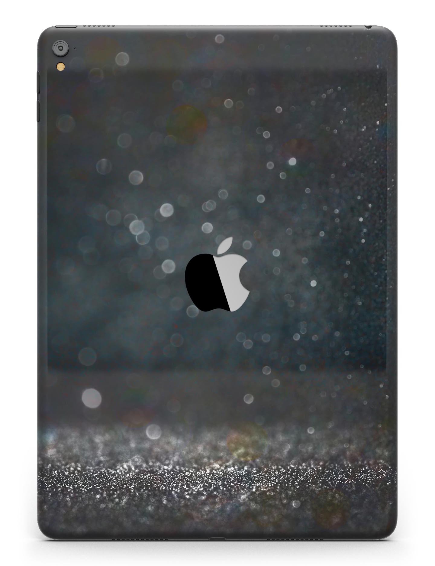 Black Unfocused Glowing Shimmer Full Body Skin for iPad Pro, showcasing its sleek design and premium vinyl material.