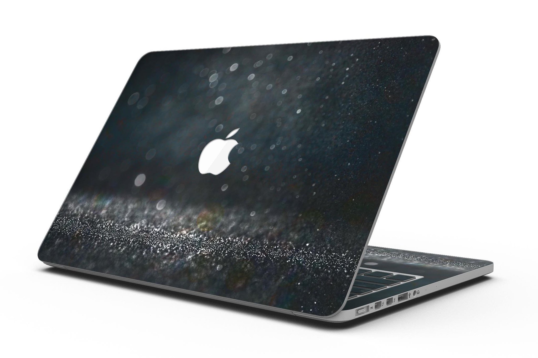 Black Unfocused Glowing Shimmer skin applied to a MacBook Pro with Retina Display, showcasing its sleek design and vibrant colors.