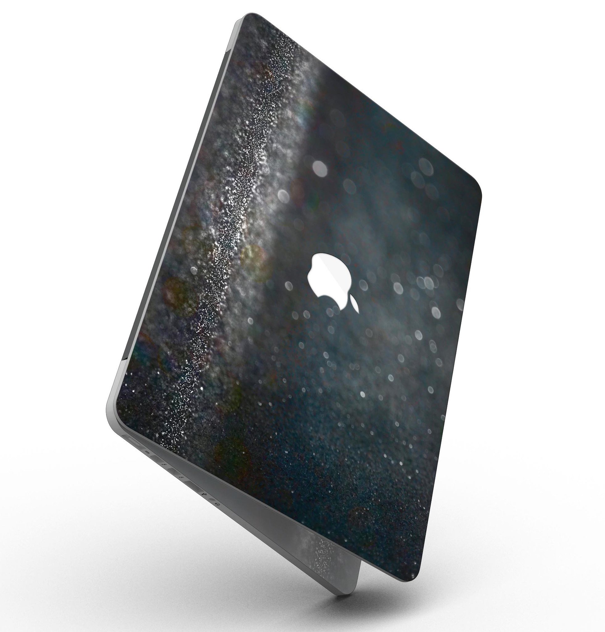 Black Unfocused Glowing Shimmer skin applied to a MacBook Pro with Retina Display, showcasing its sleek design and vibrant colors.