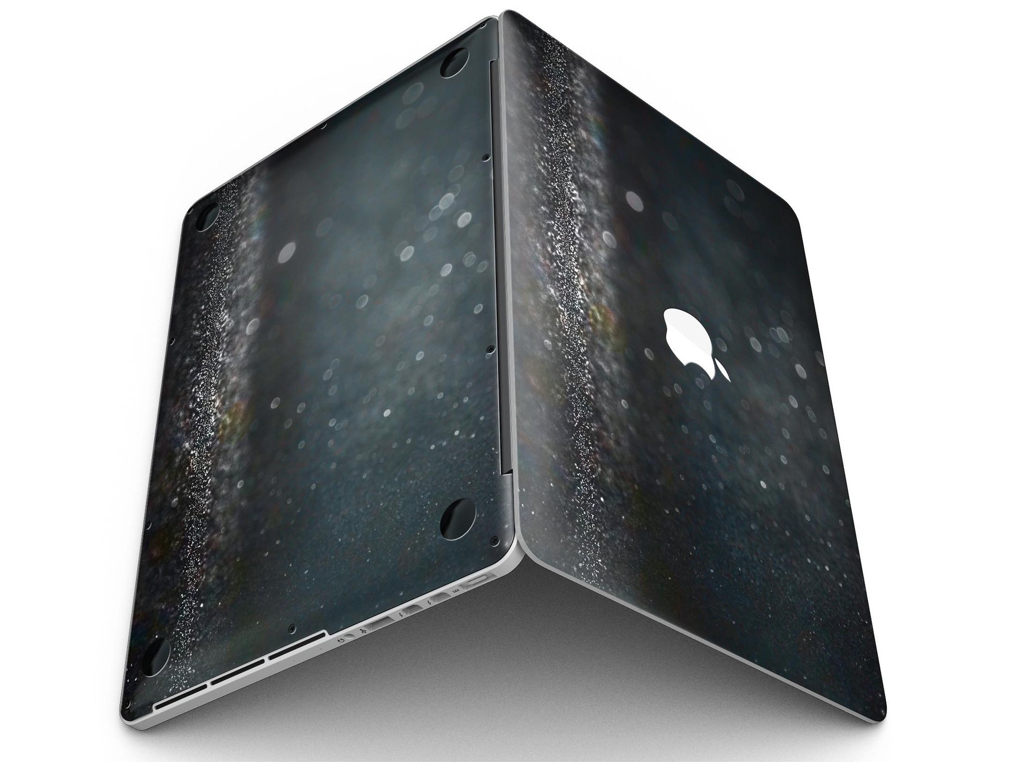 Black Unfocused Glowing Shimmer skin applied to a MacBook Pro with Retina Display, showcasing its sleek design and vibrant colors.