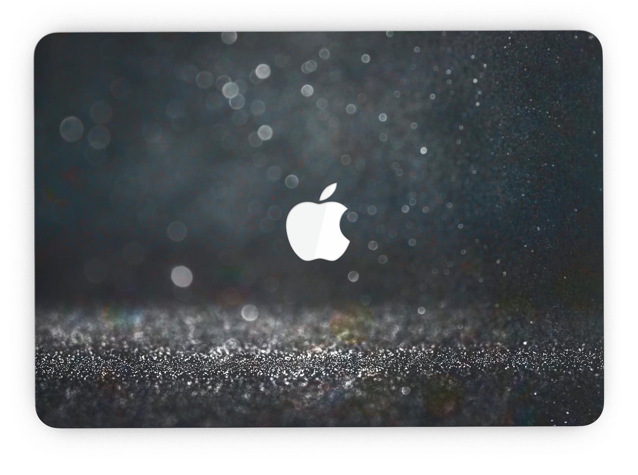 Black Unfocused Glowing Shimmer skin applied to a MacBook Pro with Retina Display, showcasing its sleek design and vibrant colors.