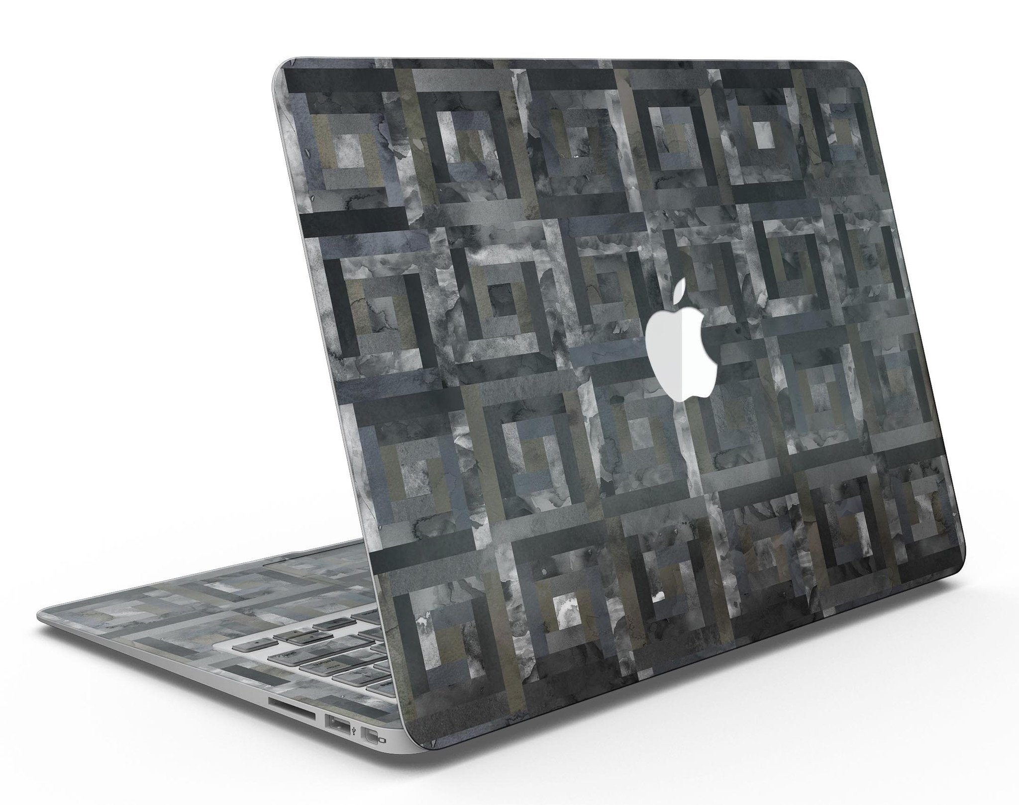 Black Watercolor Patchwork MacBook Air Skin Kit showcasing a stylish design that protects the device from scratches.