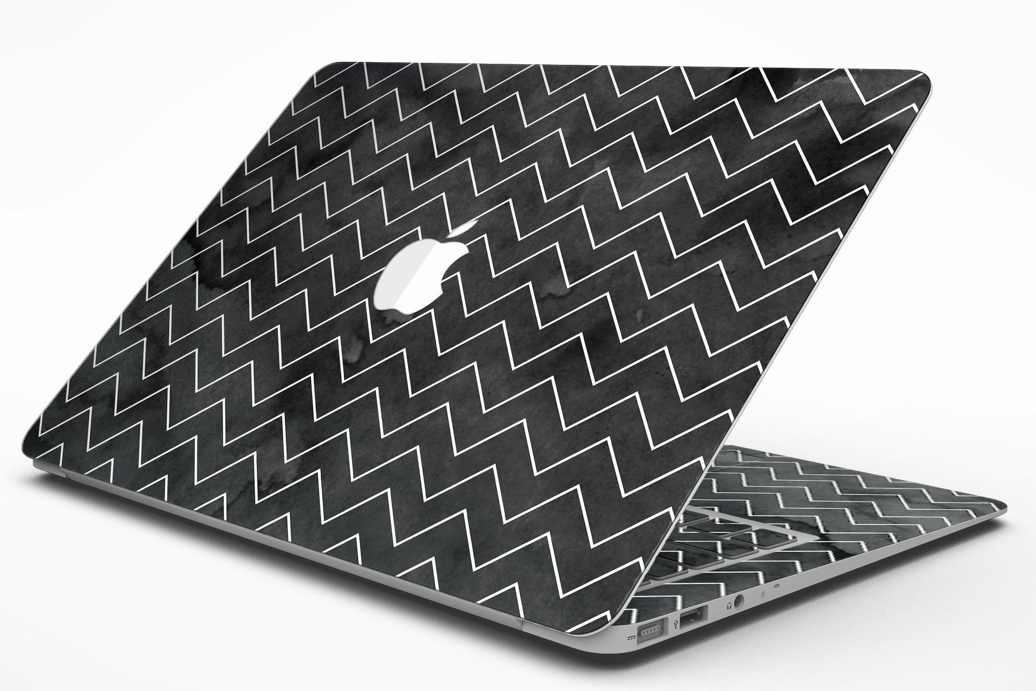 Black Watercolor MacBook Air skin featuring a white chevron pattern, showcasing a stylish and protective design.