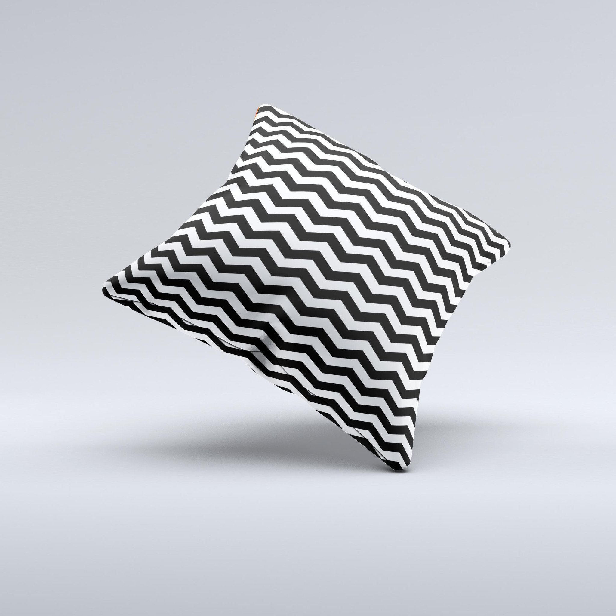 Black and white chevron pattern decorative throw pillow, handcrafted with high-quality materials, showcasing unique design imperfections.