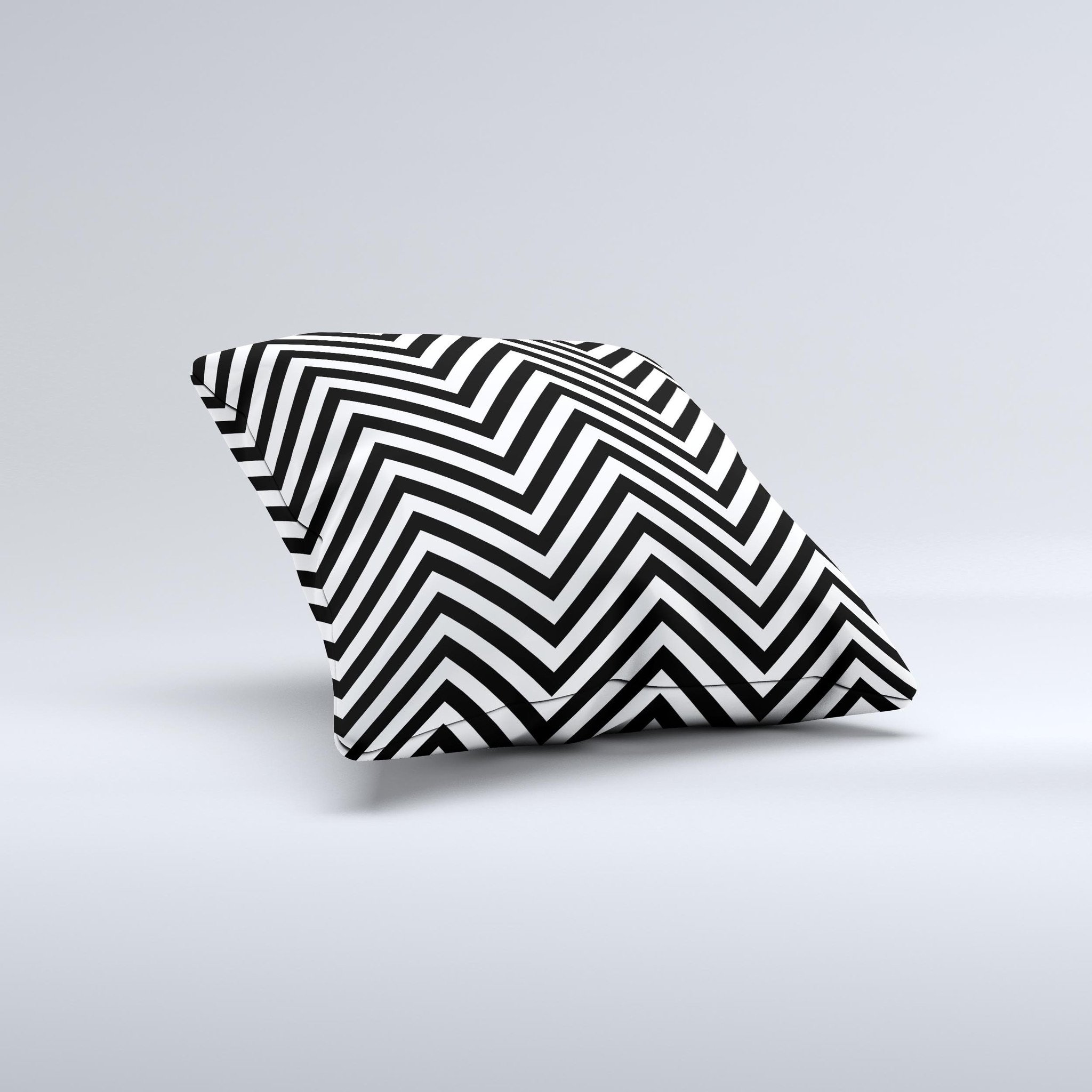 Black and white decorative throw pillow featuring a sharp chevron pattern, handcrafted in Virginia with high-quality materials.