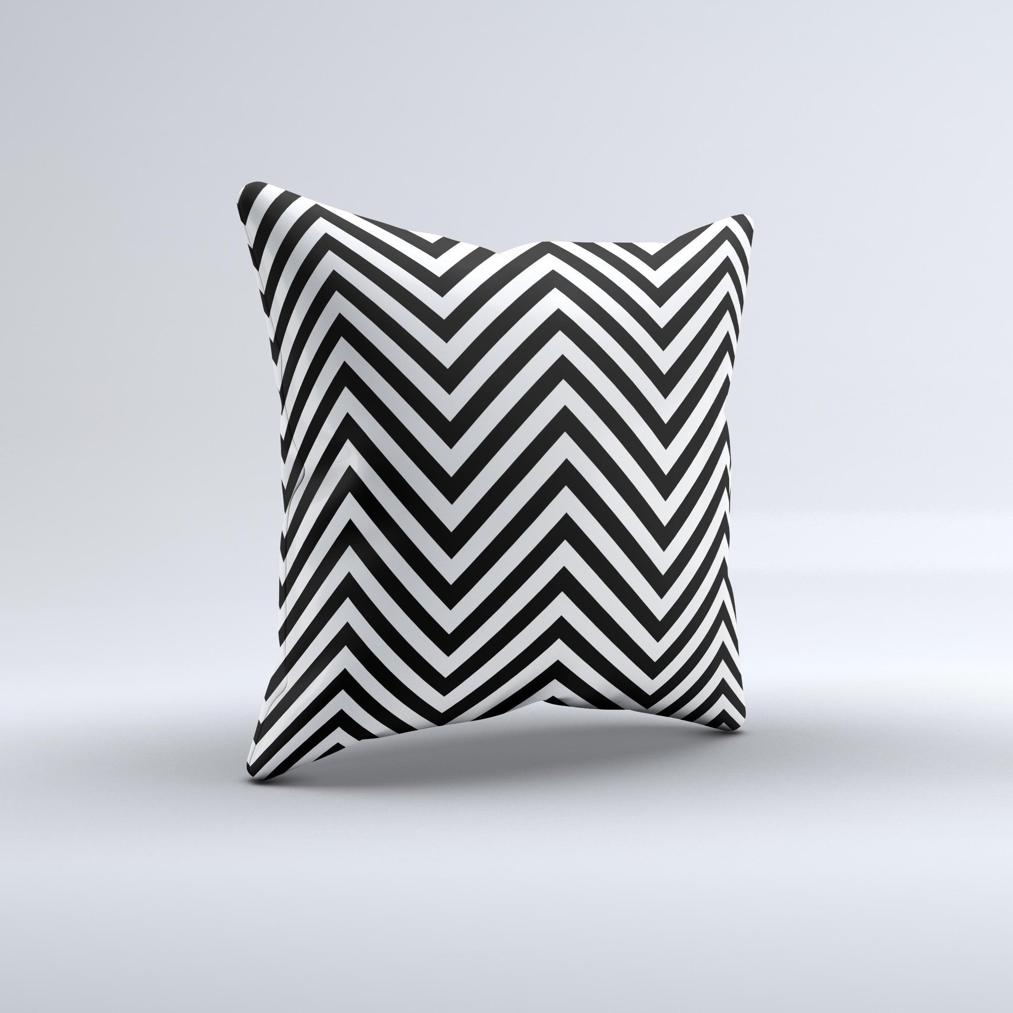 Black and white decorative throw pillow featuring a sharp chevron pattern, handcrafted in Virginia with high-quality materials.