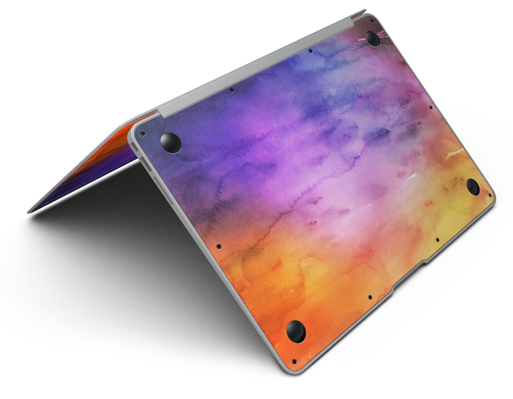 Blotted 6482 Absorbed Watercolor Texture skin applied to a MacBook Air, showcasing vibrant colors and a sleek design.