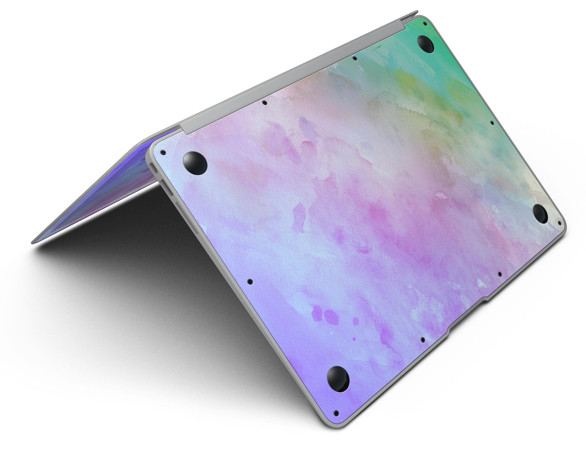 Blotted 6752 Absorbed Watercolor Texture skin applied to a MacBook Air, showcasing vibrant colors and a sleek design.