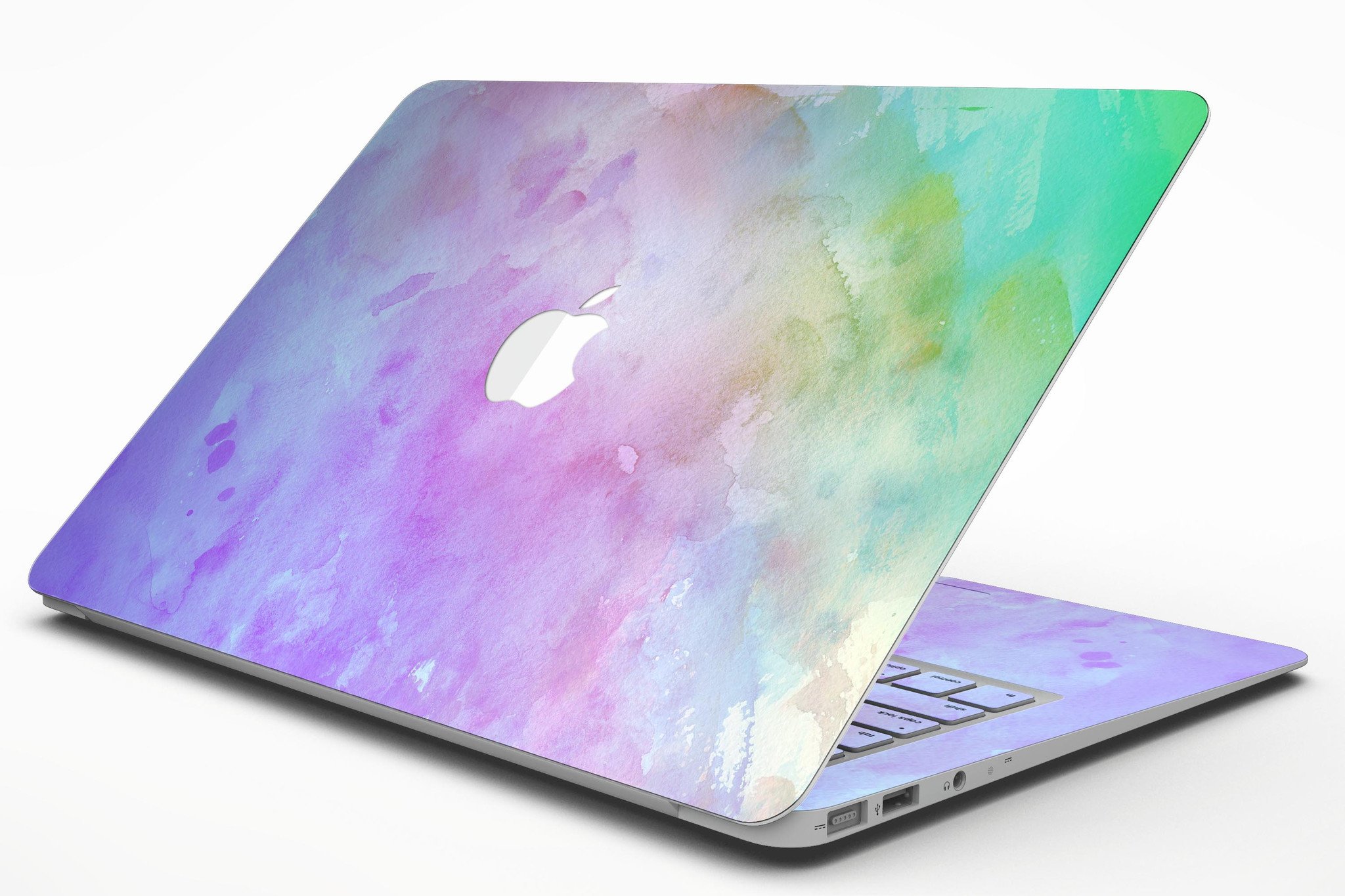 Blotted 6752 Absorbed Watercolor Texture skin applied to a MacBook Air, showcasing vibrant colors and a sleek design.