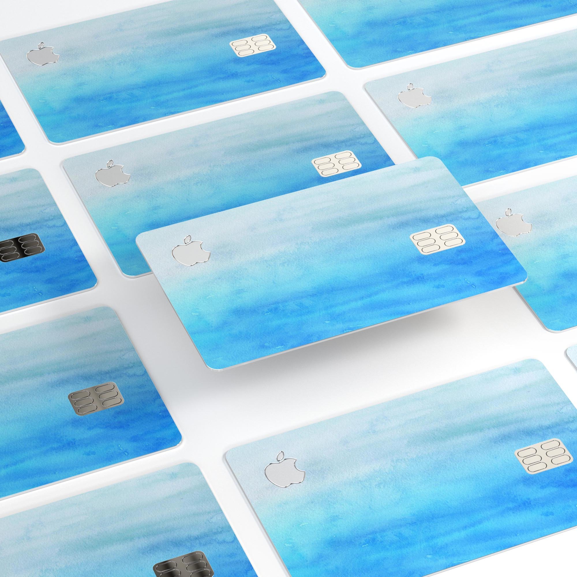 Blotted Blues Absorbed Watercolor Texture decal on an Apple Card, showcasing vibrant colors and a protective design.