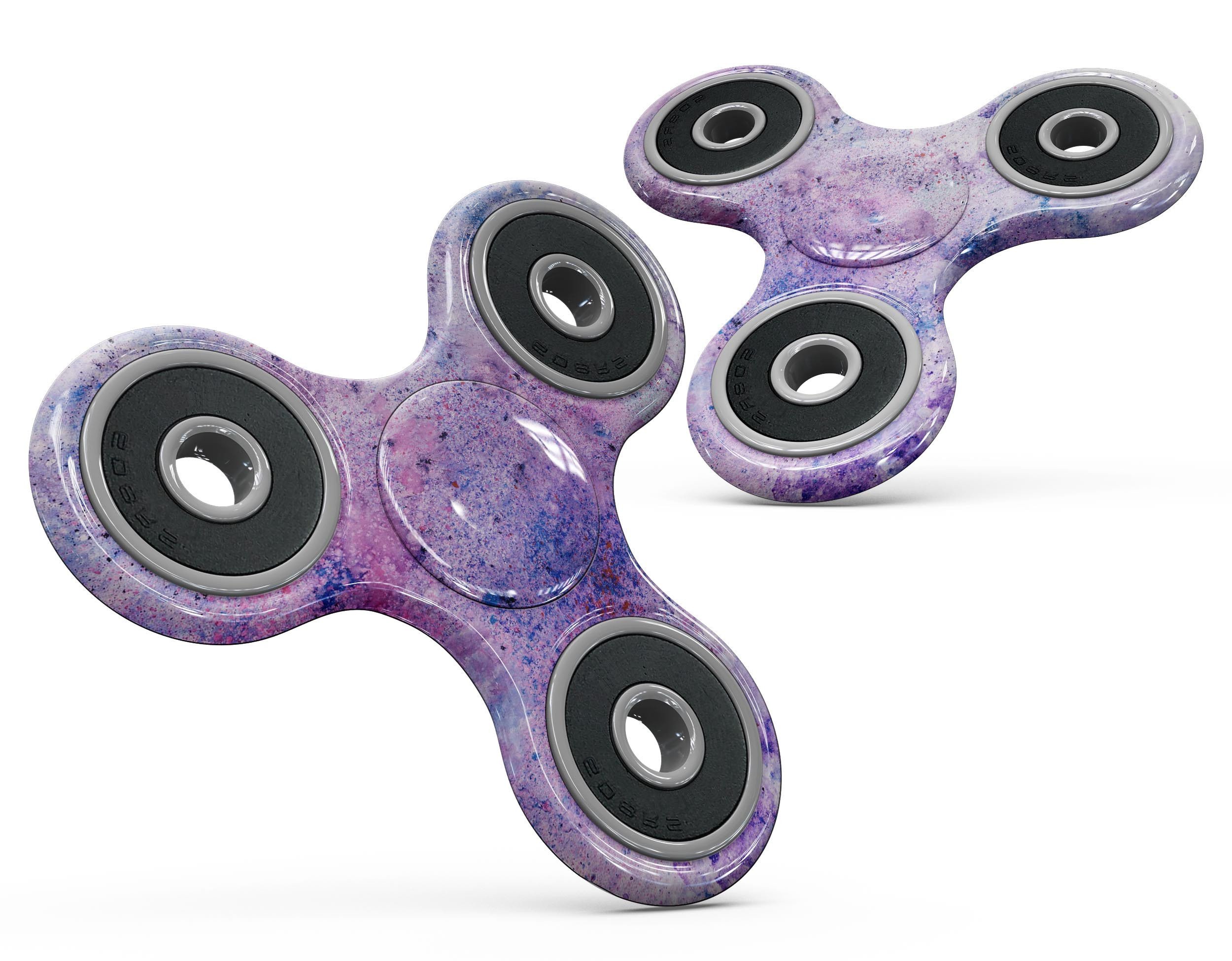 Blotted pink and purple textured skin kit for fidget spinner, showcasing vibrant colors and a sleek design.