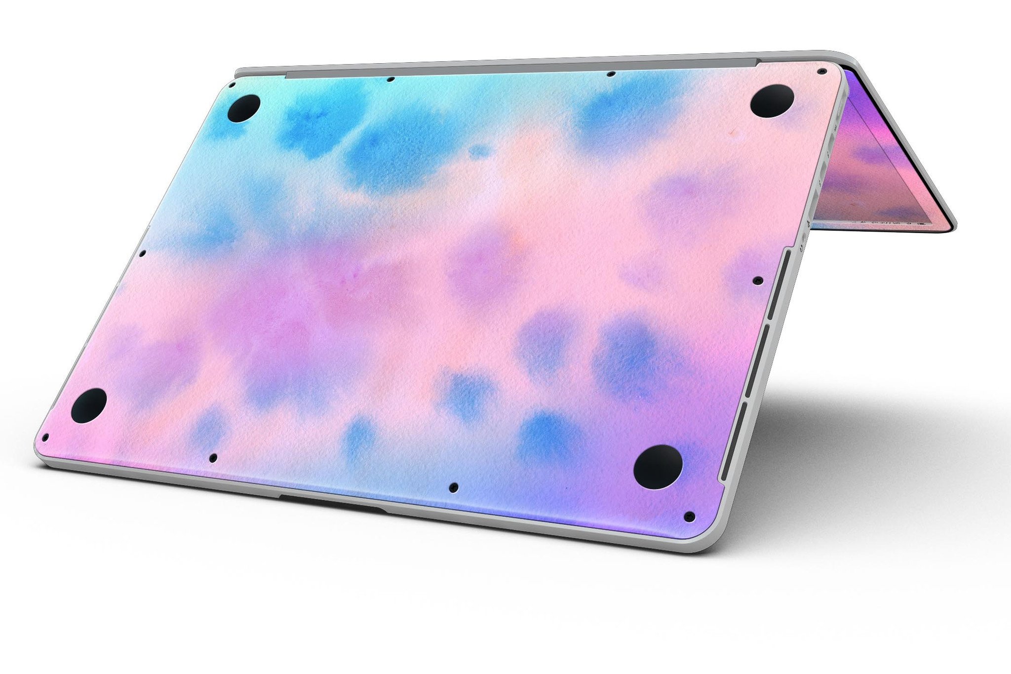 Blots 642 Absorbed Watercolor Texture skin applied to a MacBook Pro with Retina Display, showcasing vibrant colors and a stylish design.