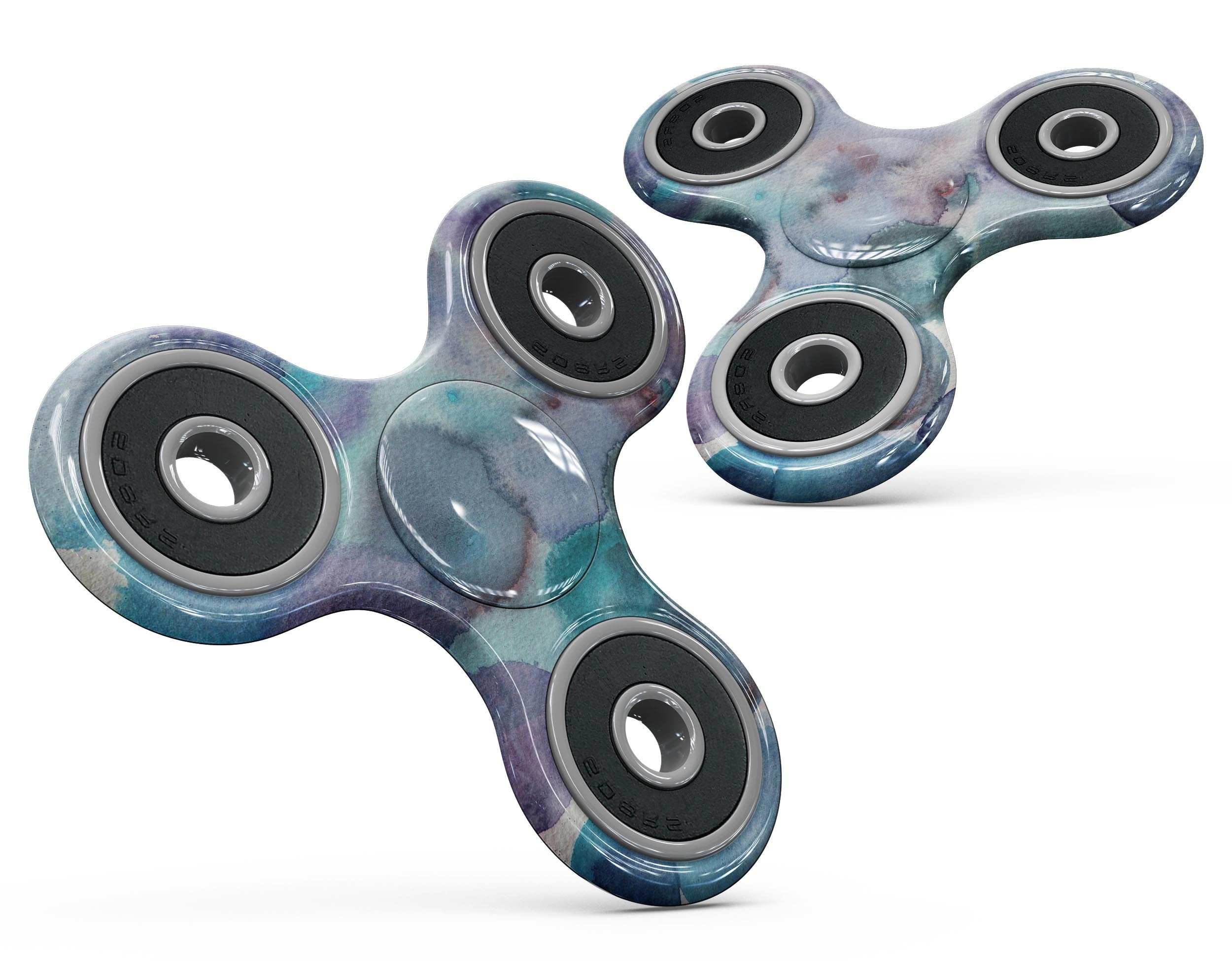 Blue 62 Absorbed Watercolor Texture Fidget Spinner Skin-Kit showcasing vibrant colors and a unique design for personalization.