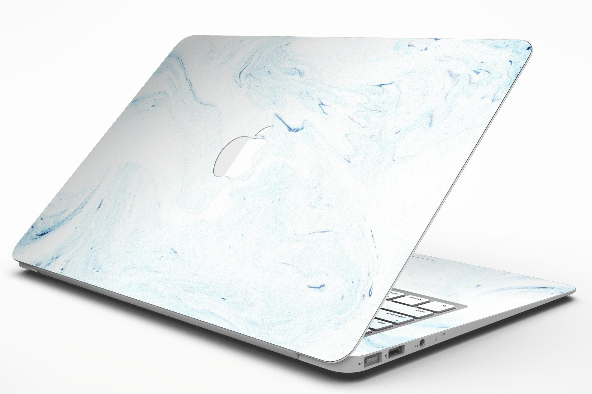 Blue 87 Textured Marble MacBook Air Skin Kit showcasing a stylish design with a textured marble finish.