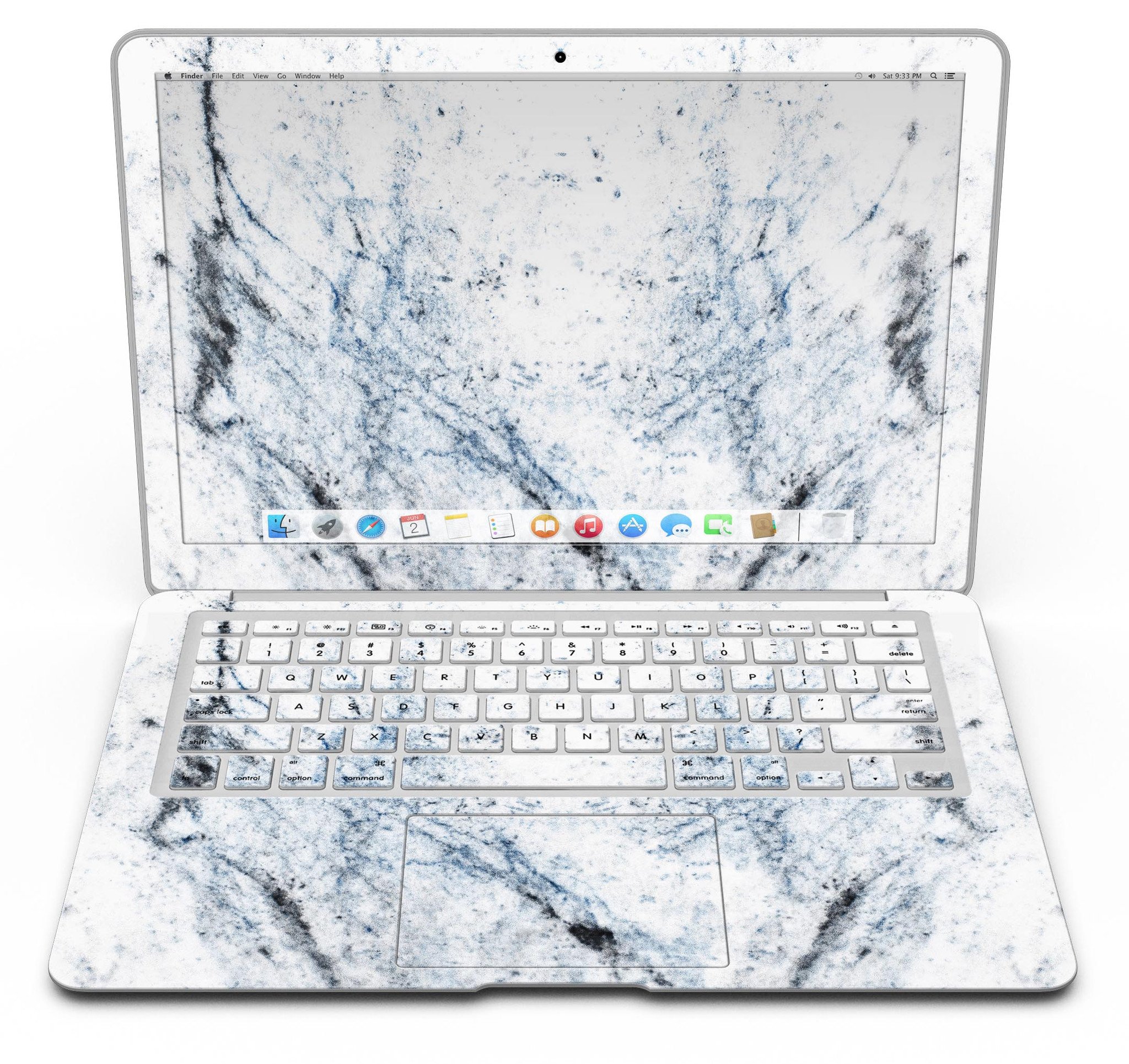 Blue and black grunge skin for MacBook Air on a white marble surface, showcasing stylish design and premium vinyl material.