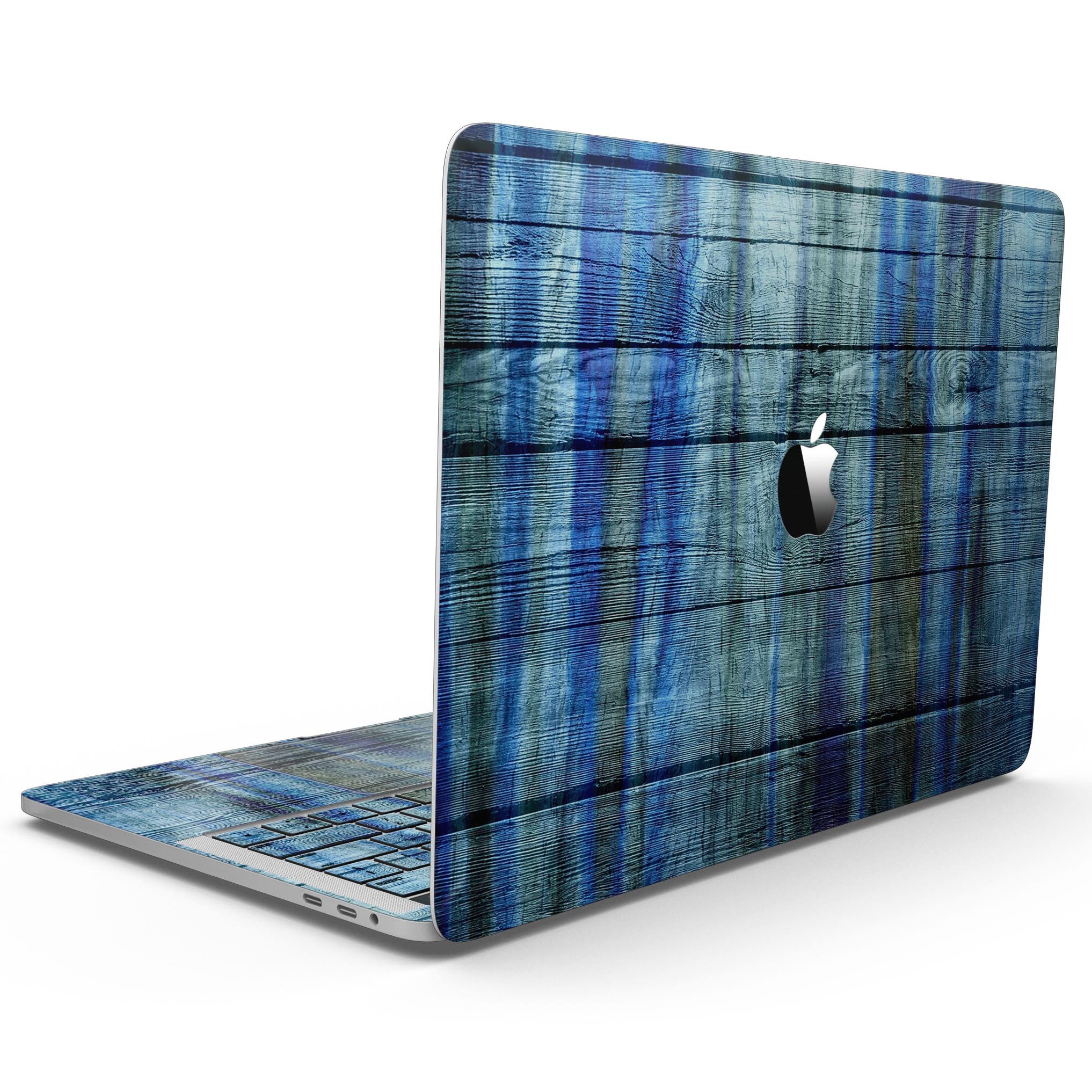 A vibrant Blue and Green Tye-Dyed Wood Skin for a 13" MacBook Pro without Touch Bar, showcasing its unique design and texture.