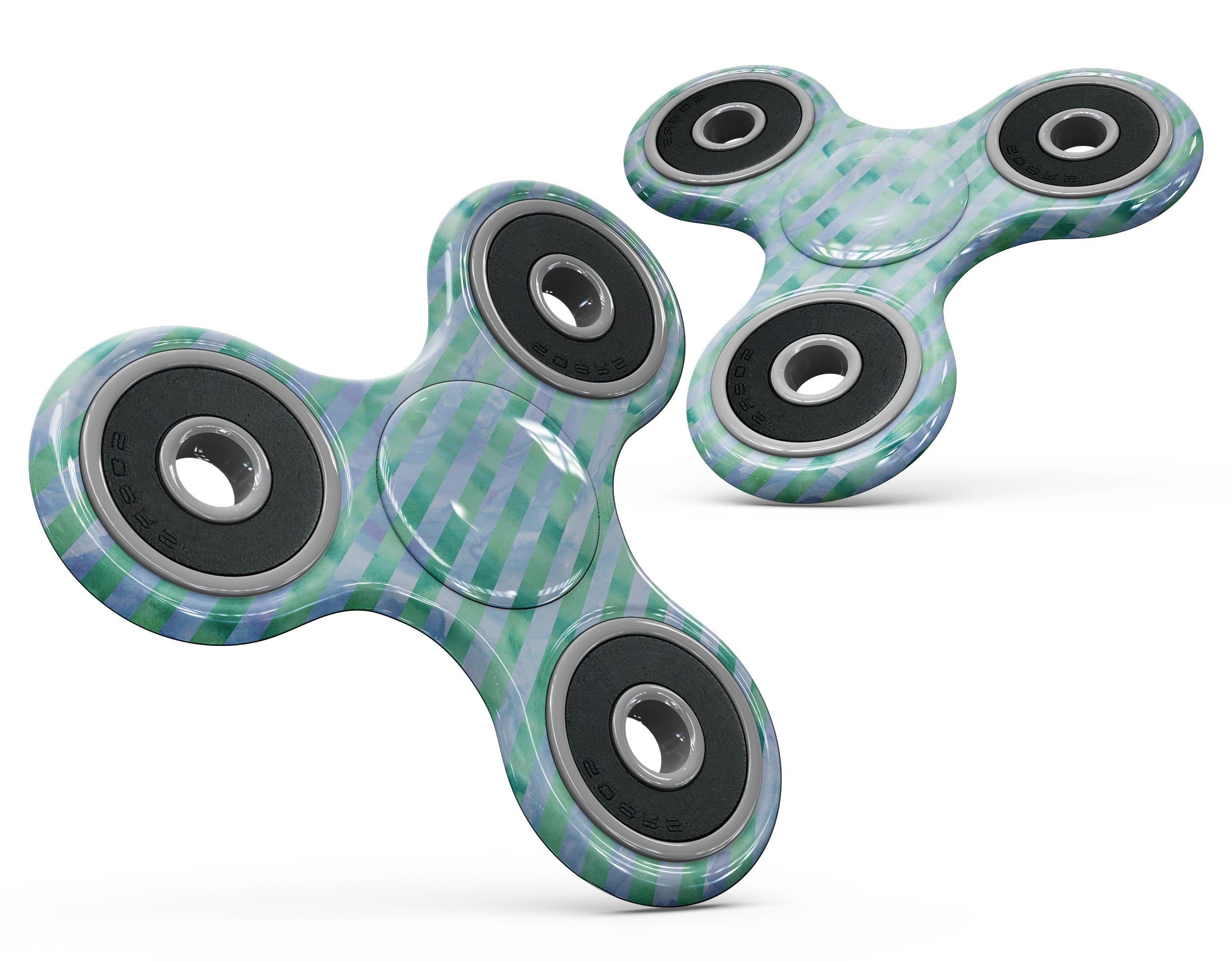 Blue and green watercolor stripes skin kit for fidget spinner, showcasing vibrant colors and a stylish design.