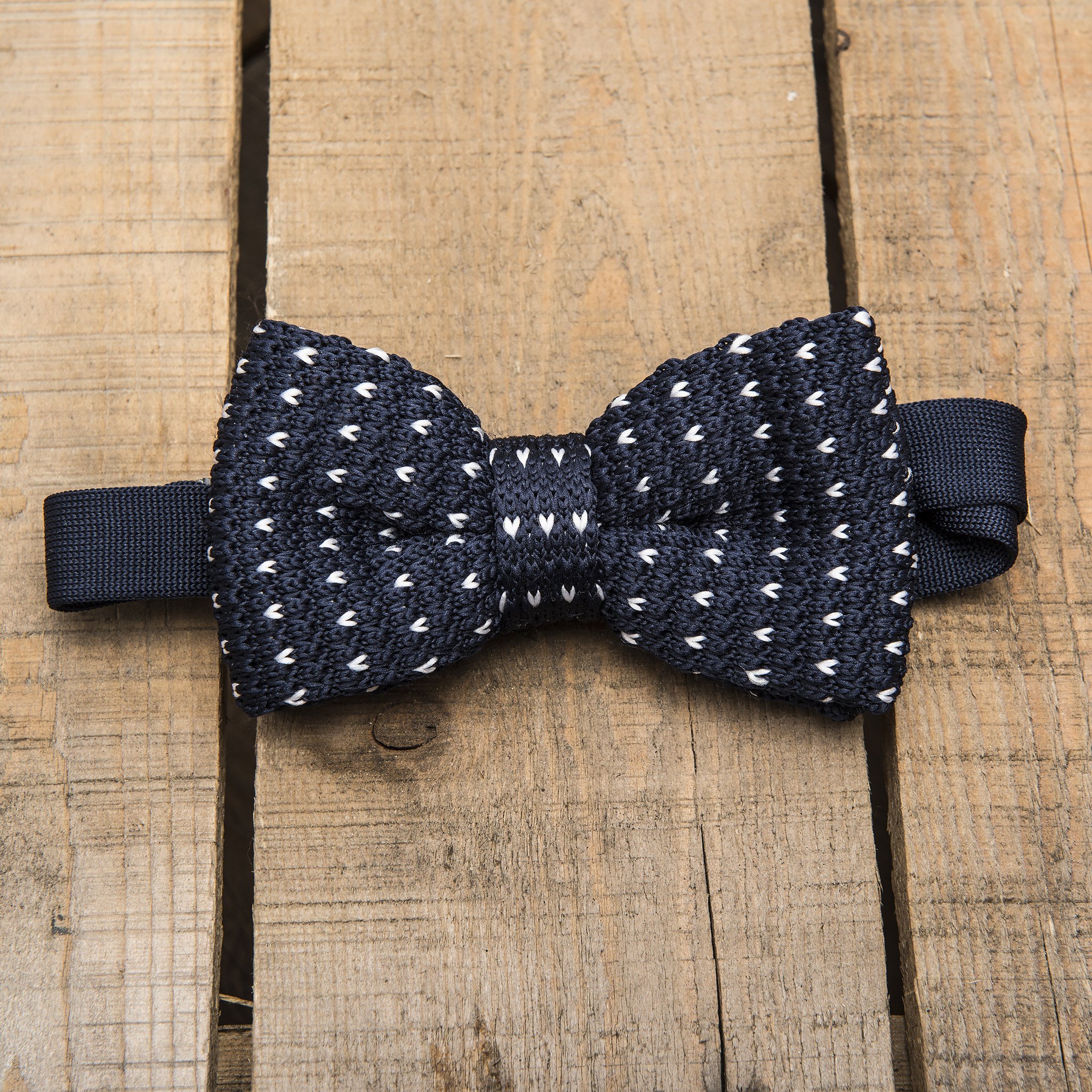 A stylish blue and white detailed knit bow tie, perfect for formal occasions and navy tailoring.