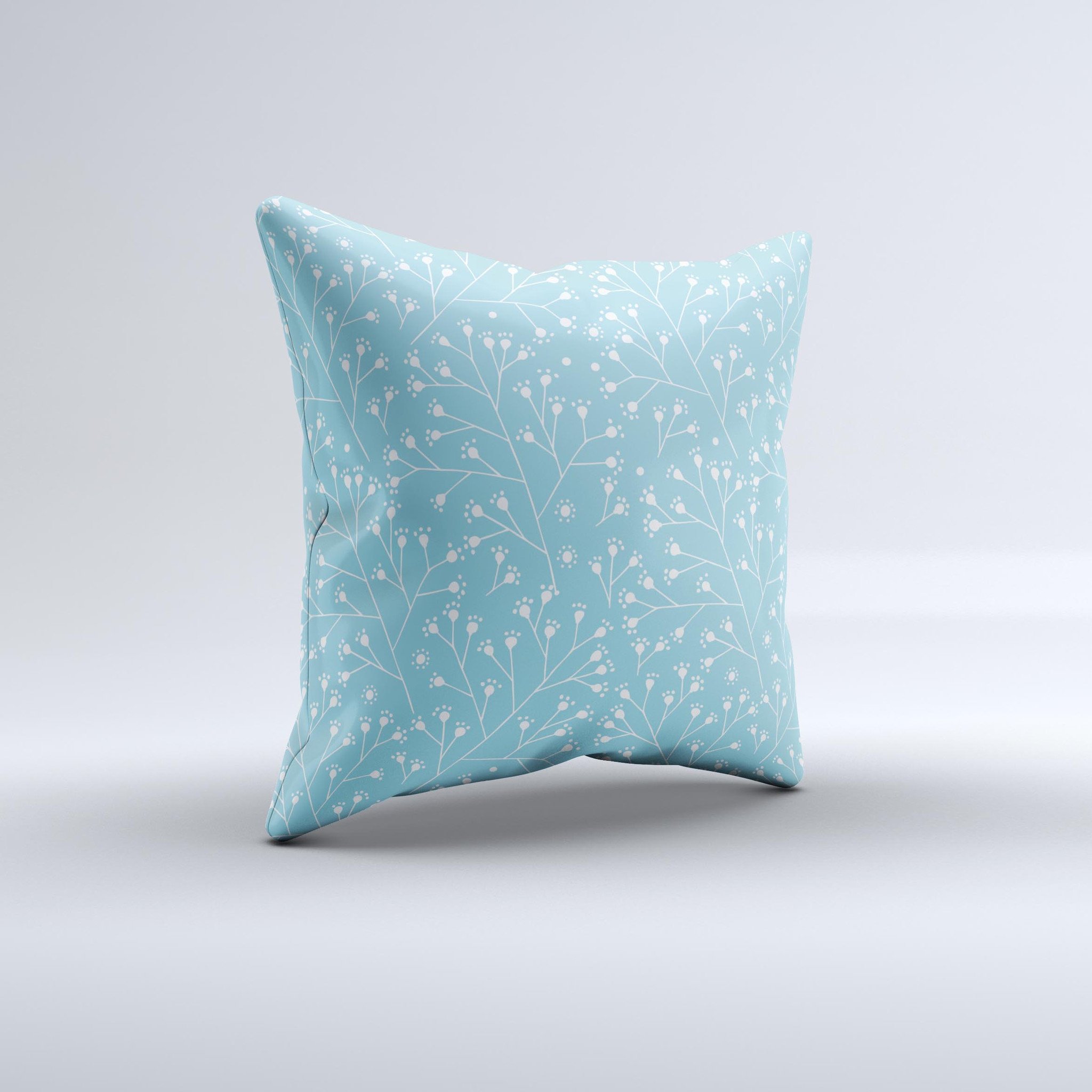 Blue and white decorative throw pillow featuring a twig pattern, handcrafted in Virginia with high-quality materials.