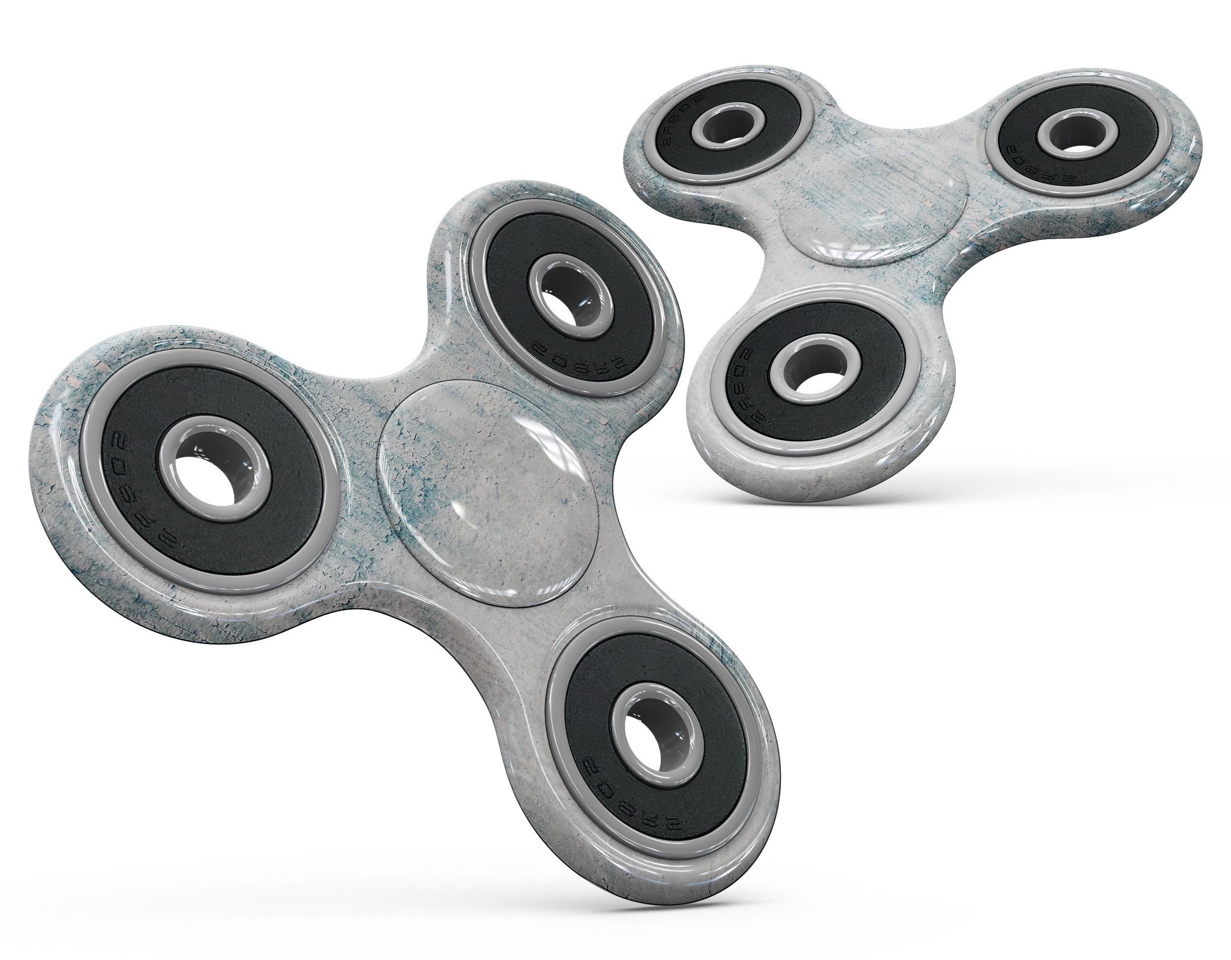 Blue Chipped Concrete Wall Skin-Kit for fidget spinner, showcasing a textured design for personalization and protection.