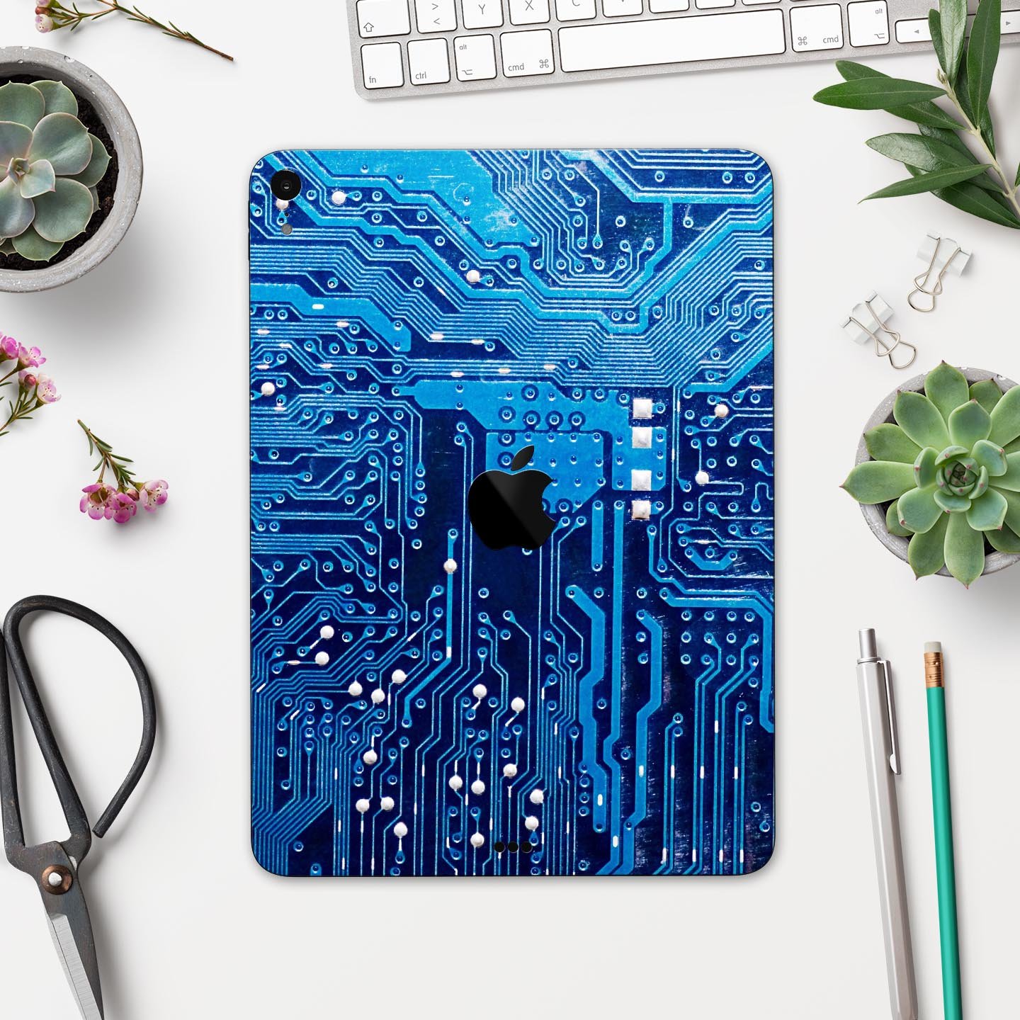 Blue Circuit Board V1 skin decal for Apple iPad Pro, showcasing a vibrant circuit design with premium finish.