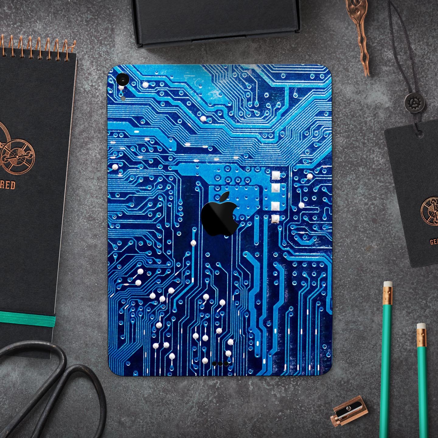 Blue Circuit Board V1 skin decal for Apple iPad Pro, showcasing a vibrant circuit design with premium finish.