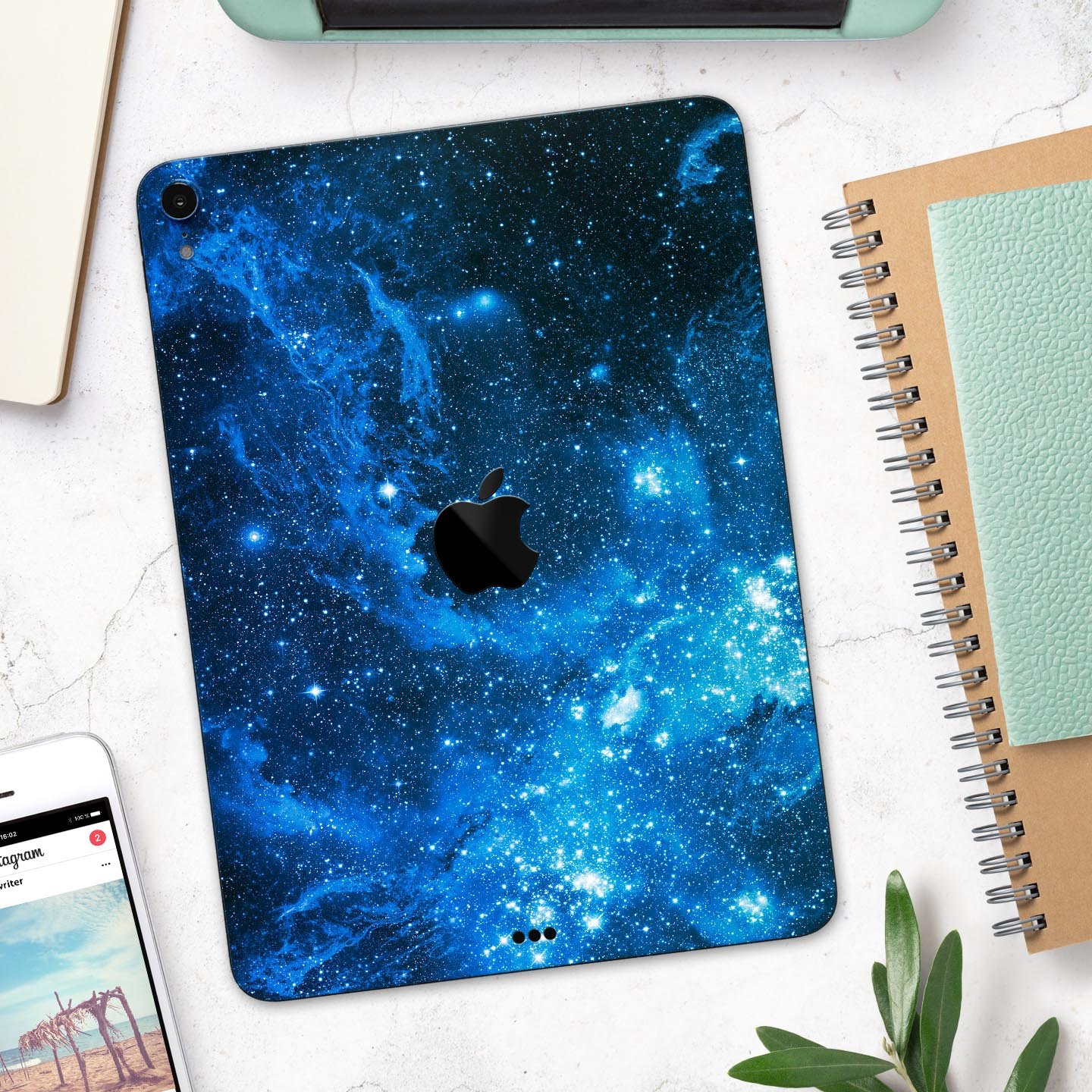 Blue Hue Nebula skin decal for Apple iPad Pro 12.9", showcasing vibrant cosmic design and premium finish.