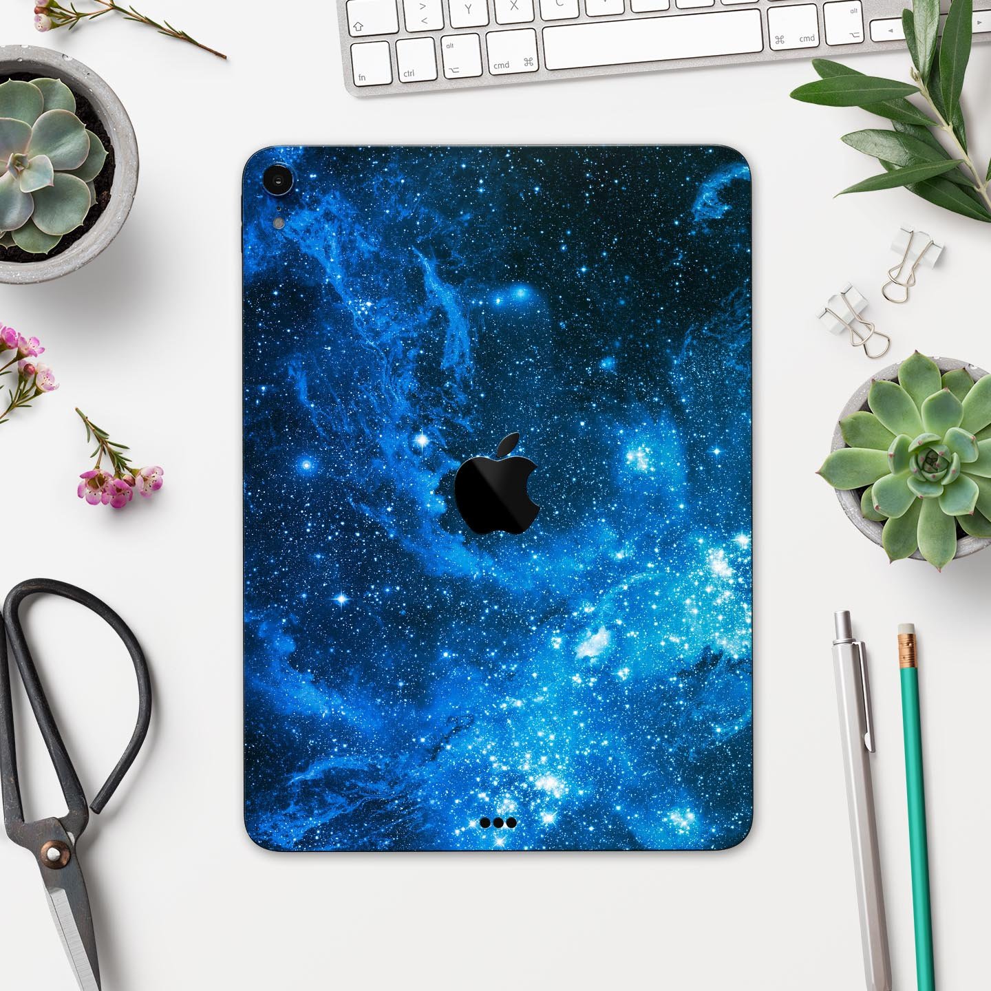 Blue Hue Nebula skin decal for Apple iPad Pro 12.9", showcasing vibrant cosmic design and premium finish.