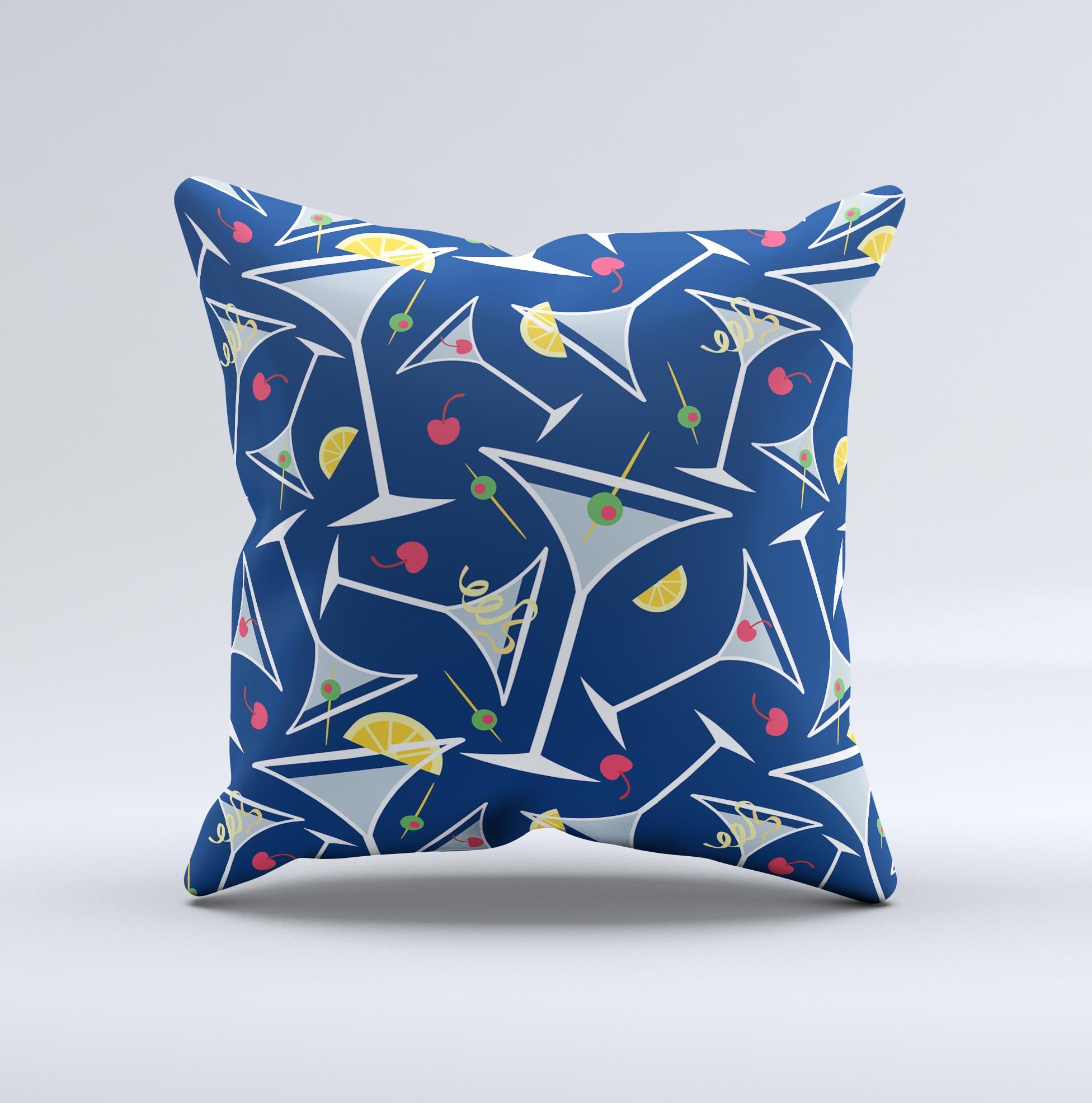 A decorative throw pillow featuring a blue martini drink with lemons, handcrafted in Virginia, showcasing vibrant colors and unique design.