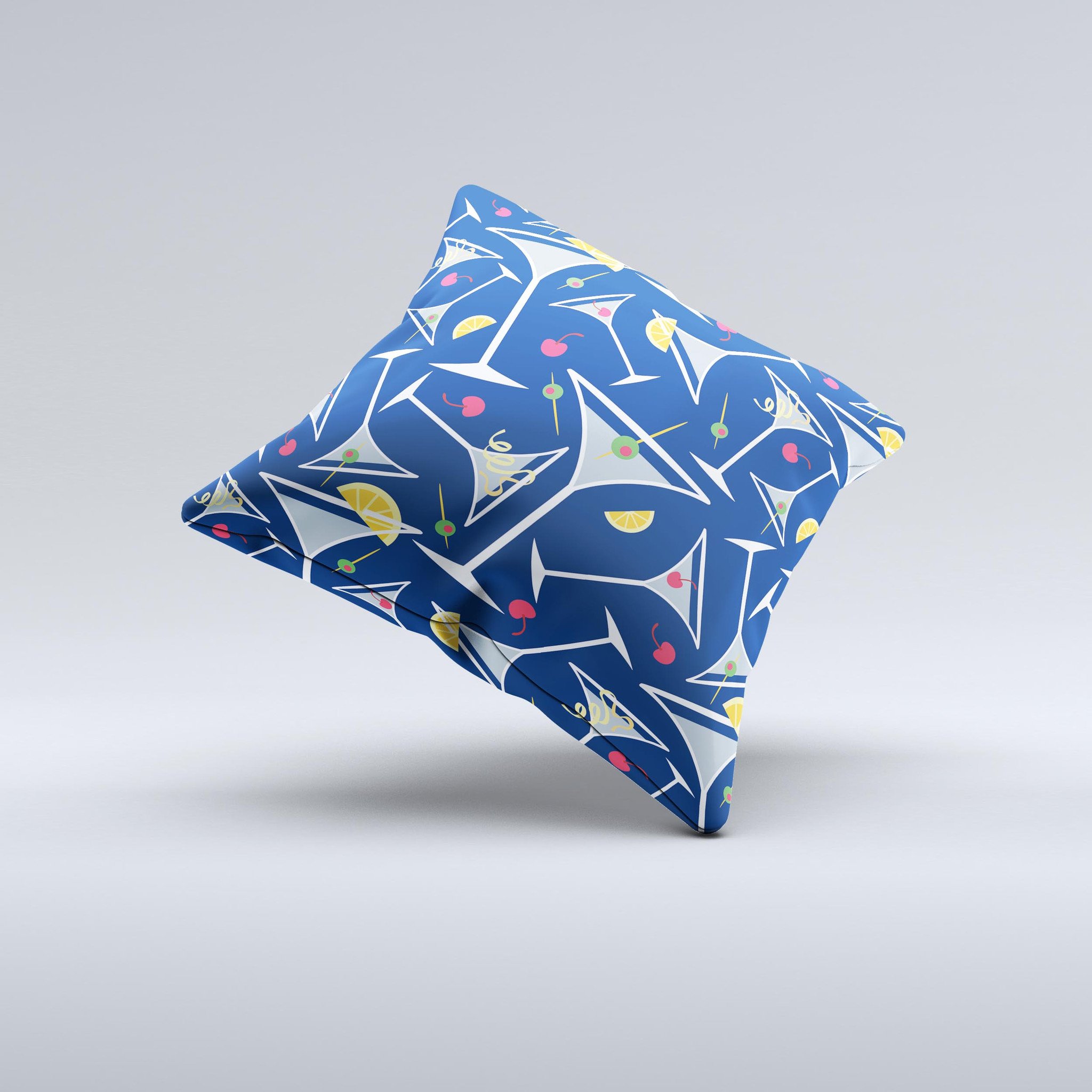 A decorative throw pillow featuring a blue martini drink with lemons, handcrafted in Virginia, showcasing vibrant colors and unique design.