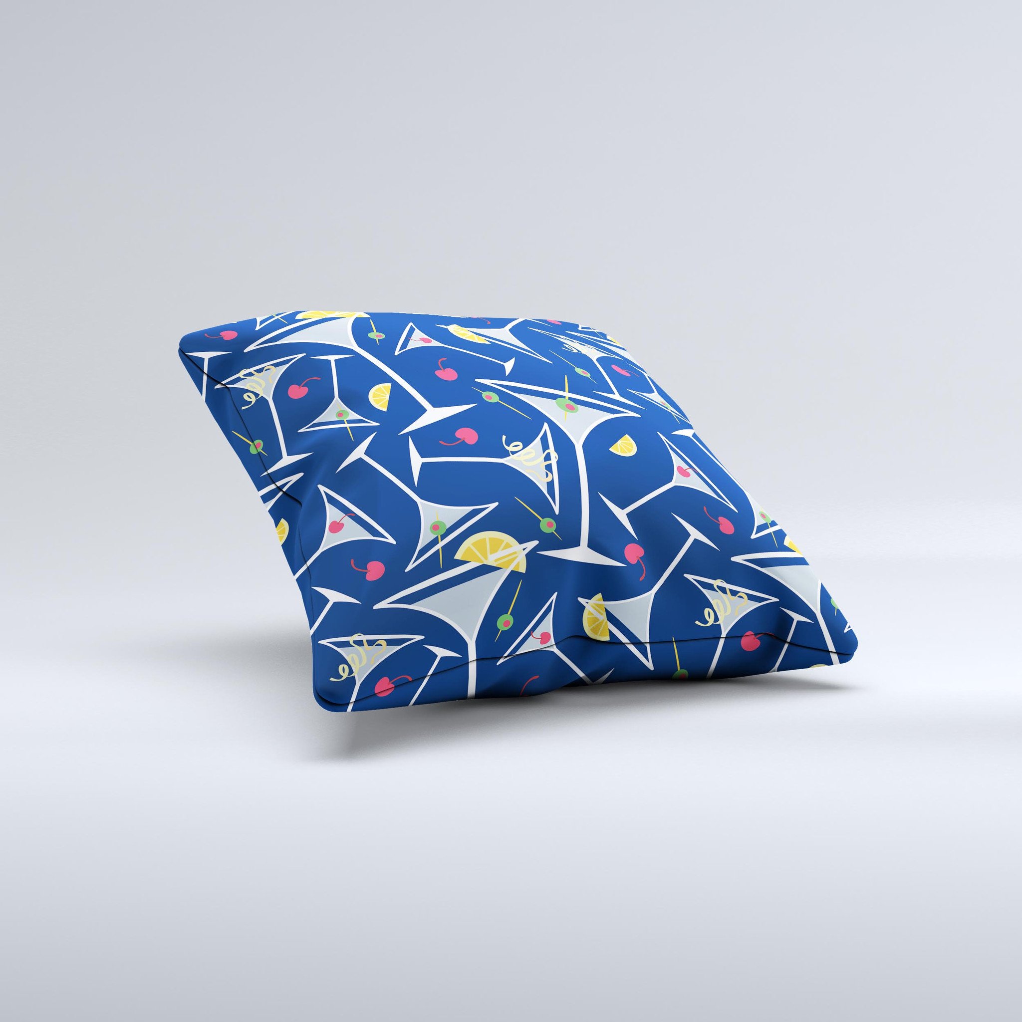 A decorative throw pillow featuring a blue martini drink with lemons, handcrafted in Virginia, showcasing vibrant colors and unique design.