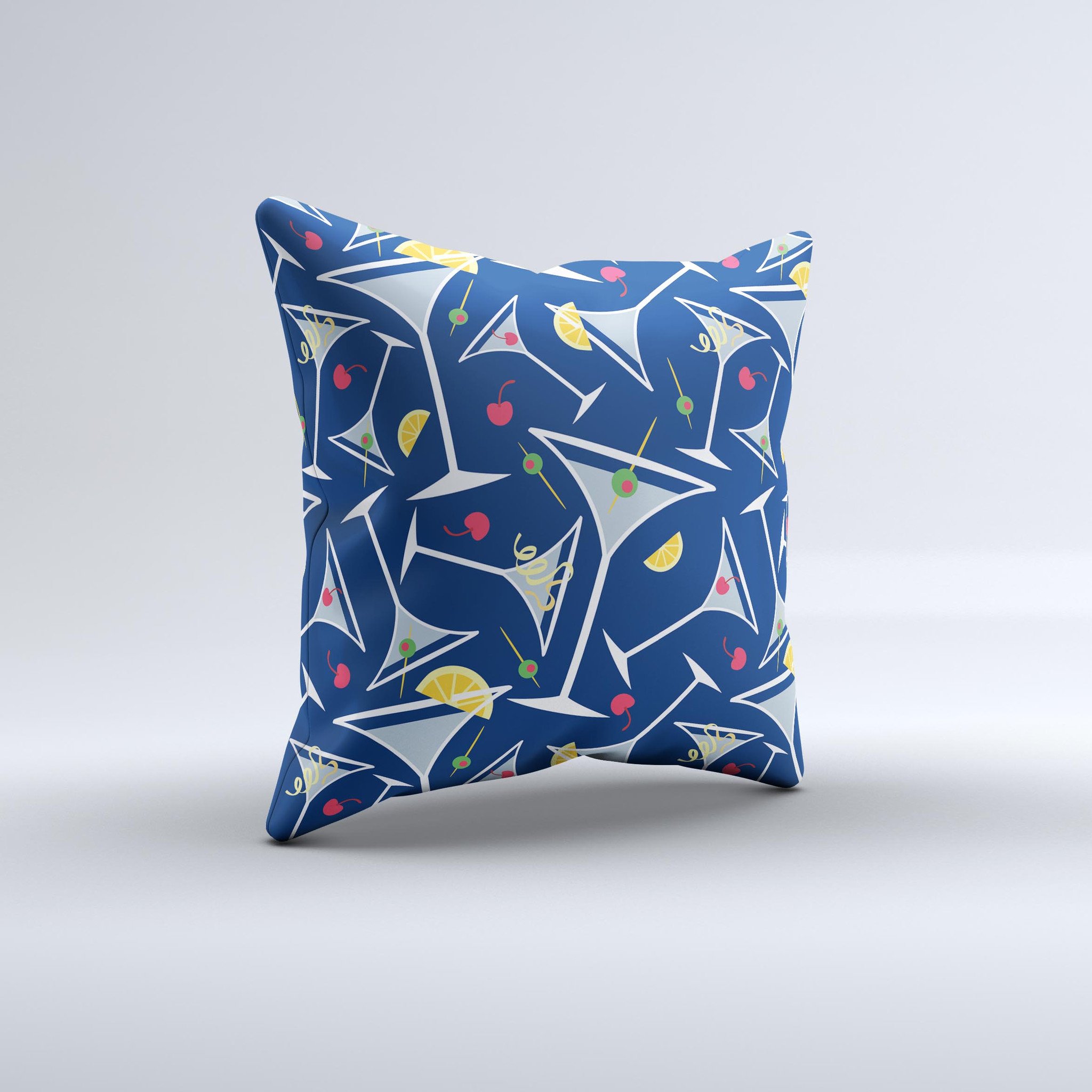 A decorative throw pillow featuring a blue martini drink with lemons, handcrafted in Virginia, showcasing vibrant colors and unique design.