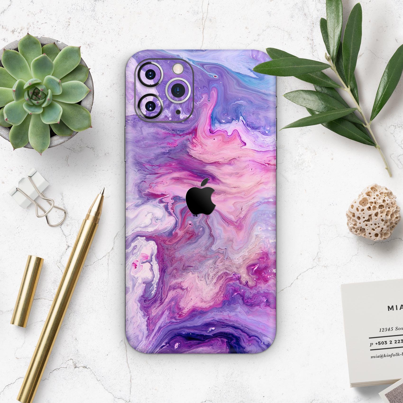 Blue and pink abstract acrylic skin for iPhone 11, showcasing vibrant colors and a sleek design.