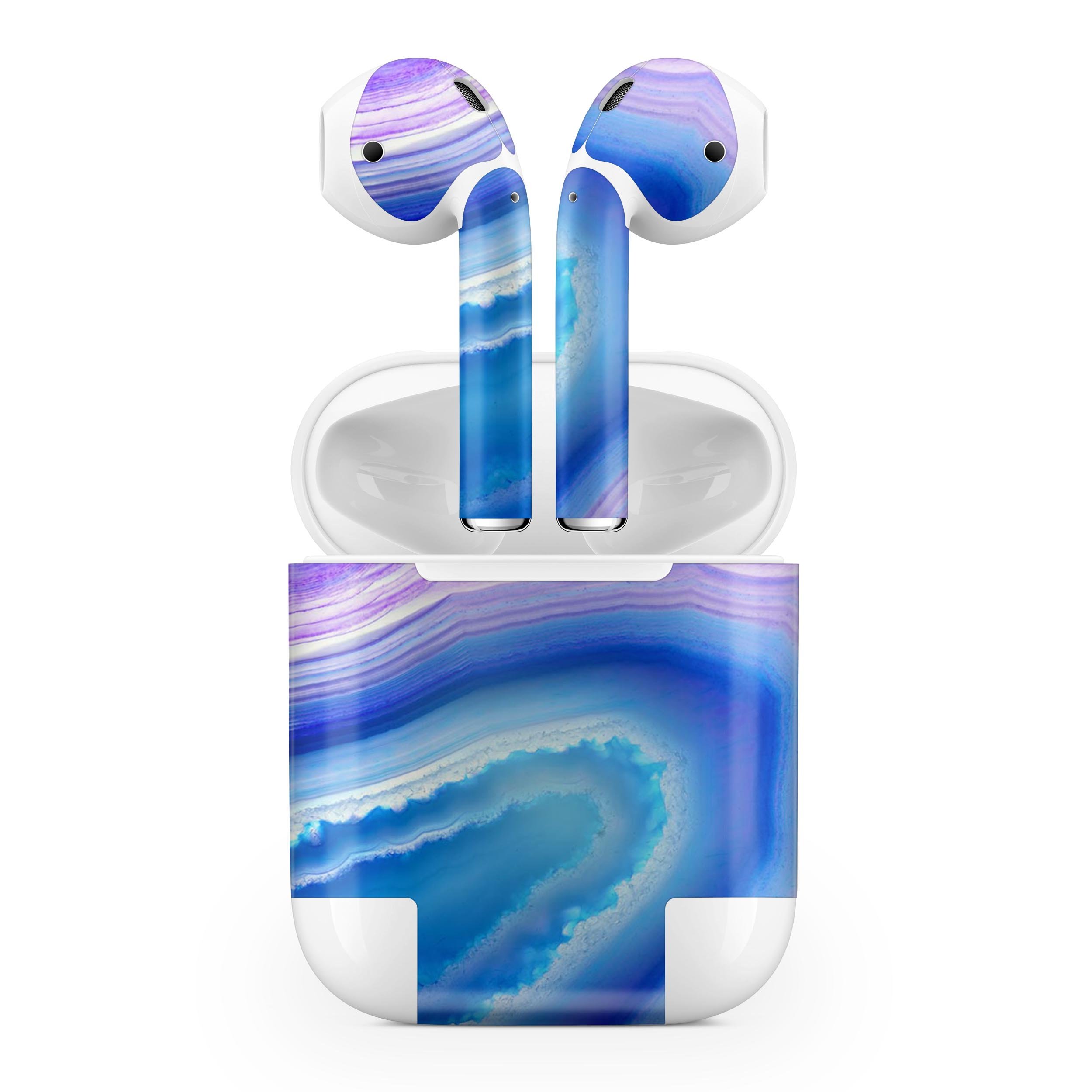 Blue and purple agate design skin decal wrap for Apple AirPods, showcasing vibrant colors and a sleek finish.