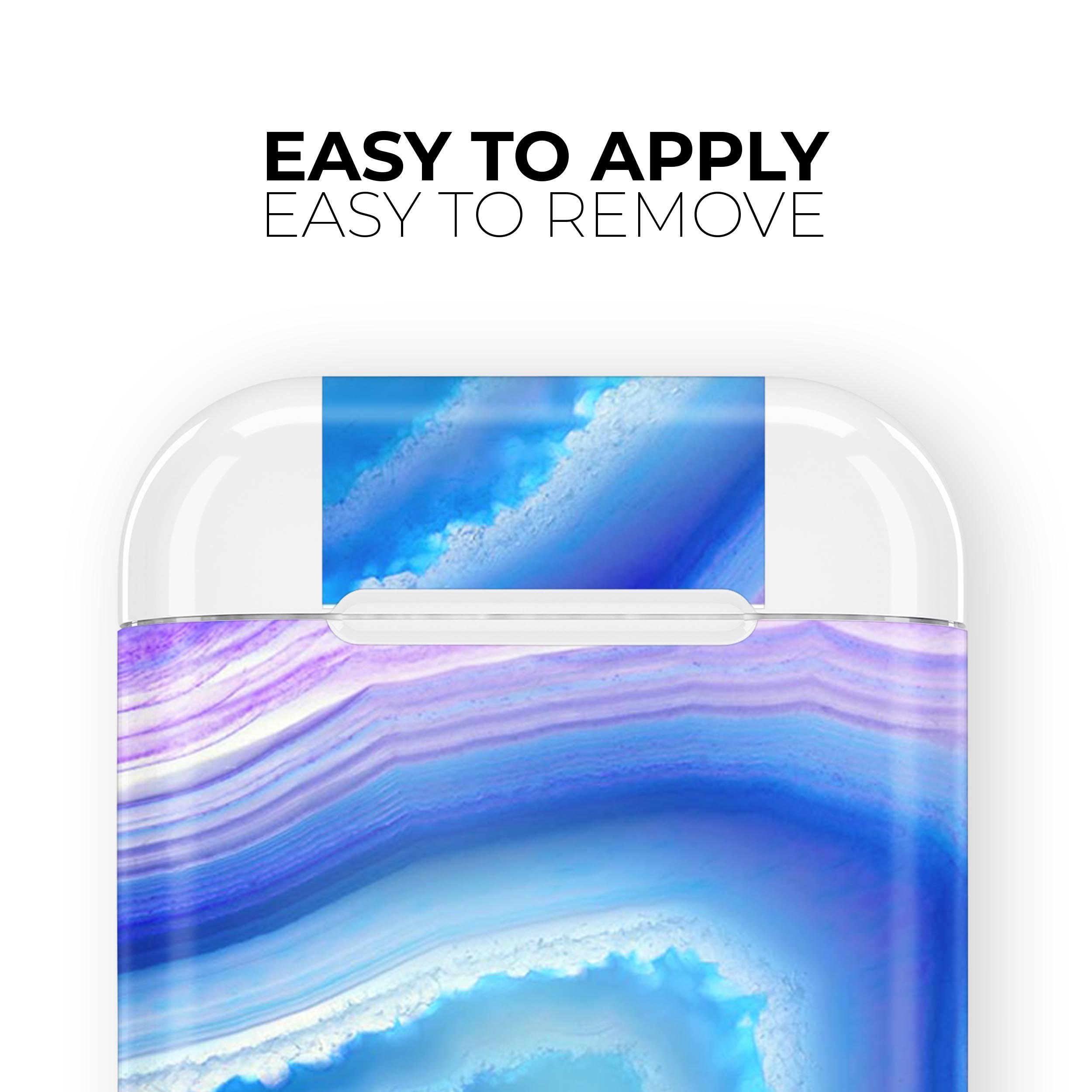 Blue and purple agate design skin decal wrap for Apple AirPods, showcasing vibrant colors and a sleek finish.