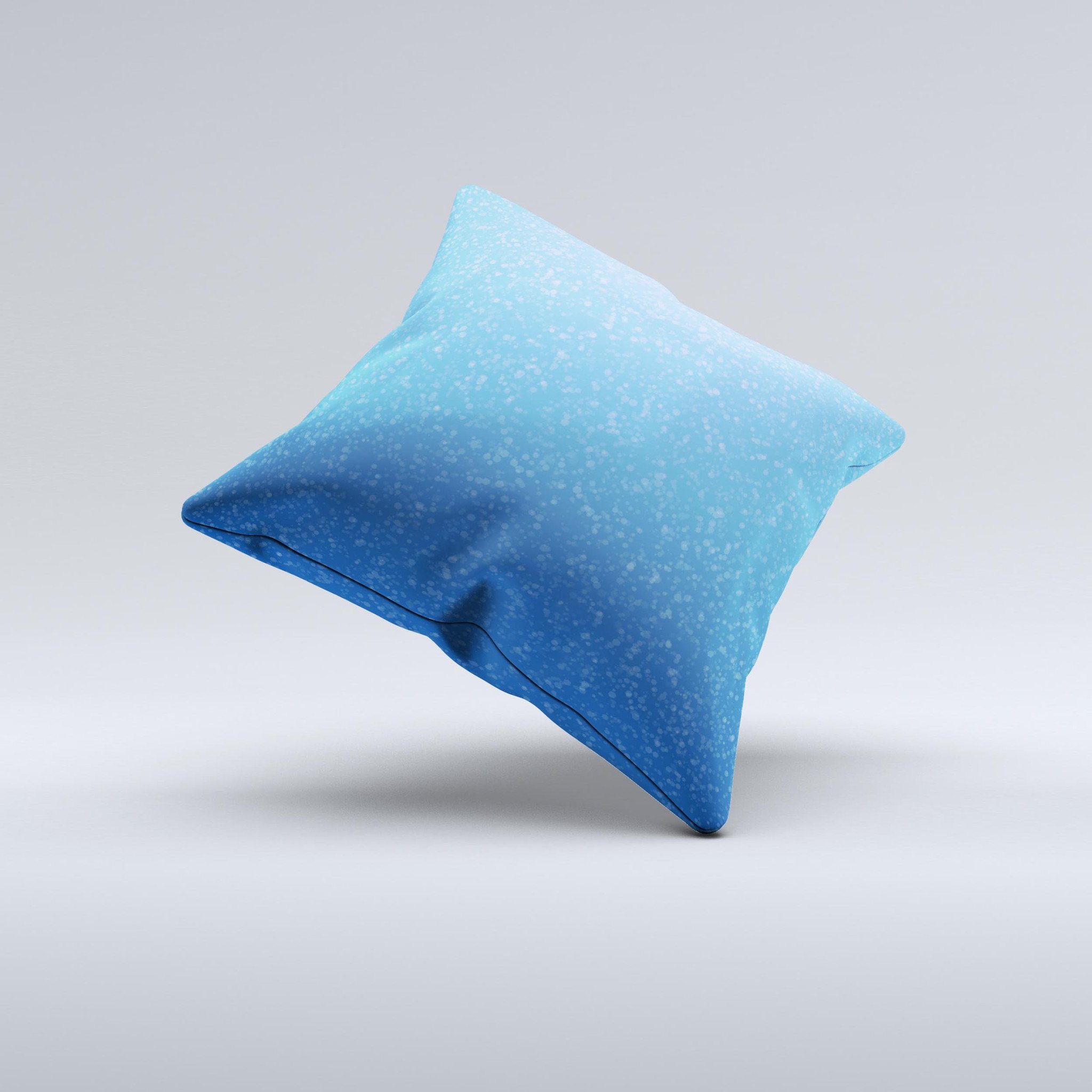 Blue decorative throw pillow with subtle speckles, handcrafted in Virginia, showcasing unique design and high-quality fabric.