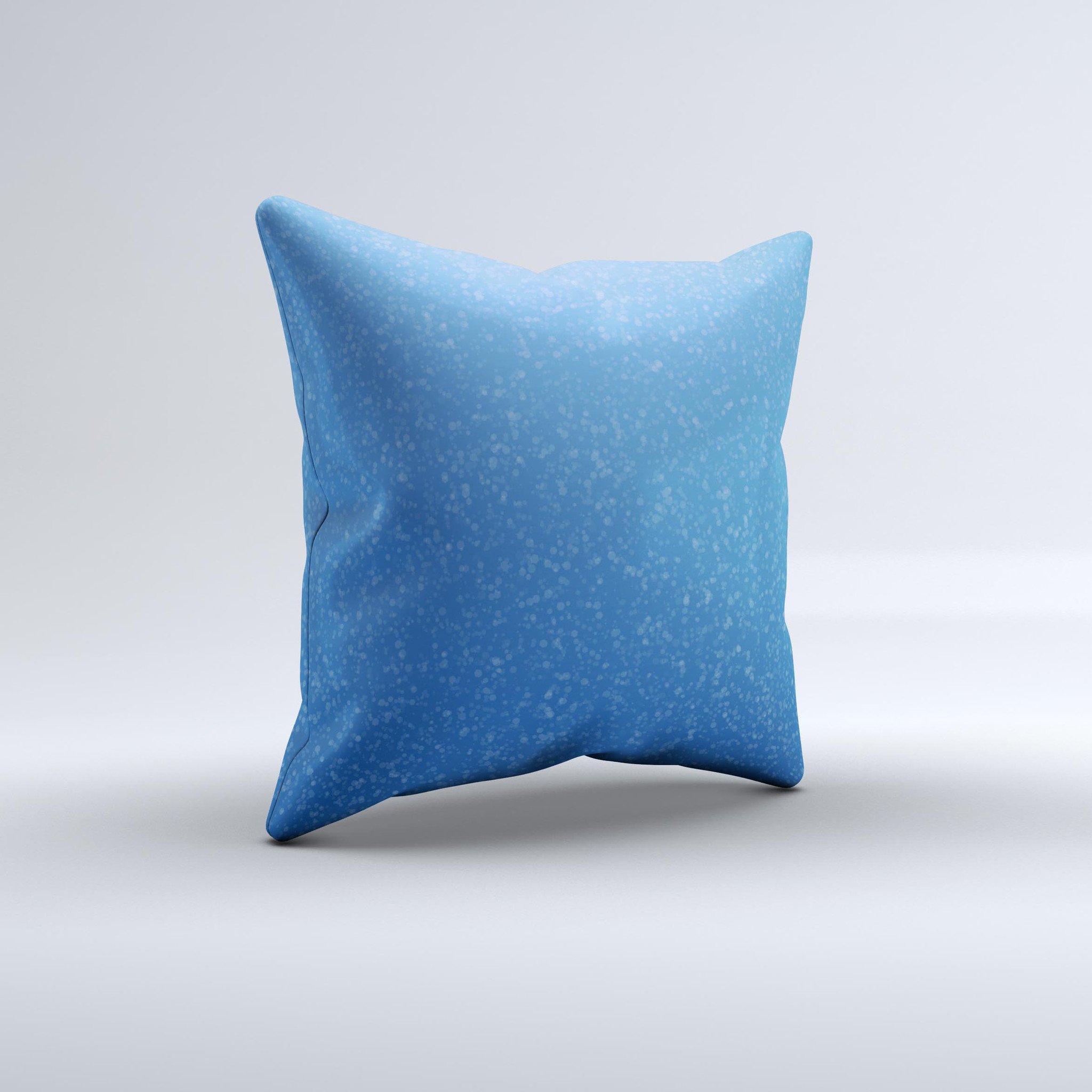 Blue decorative throw pillow with subtle speckles, handcrafted in Virginia, showcasing unique design and high-quality fabric.