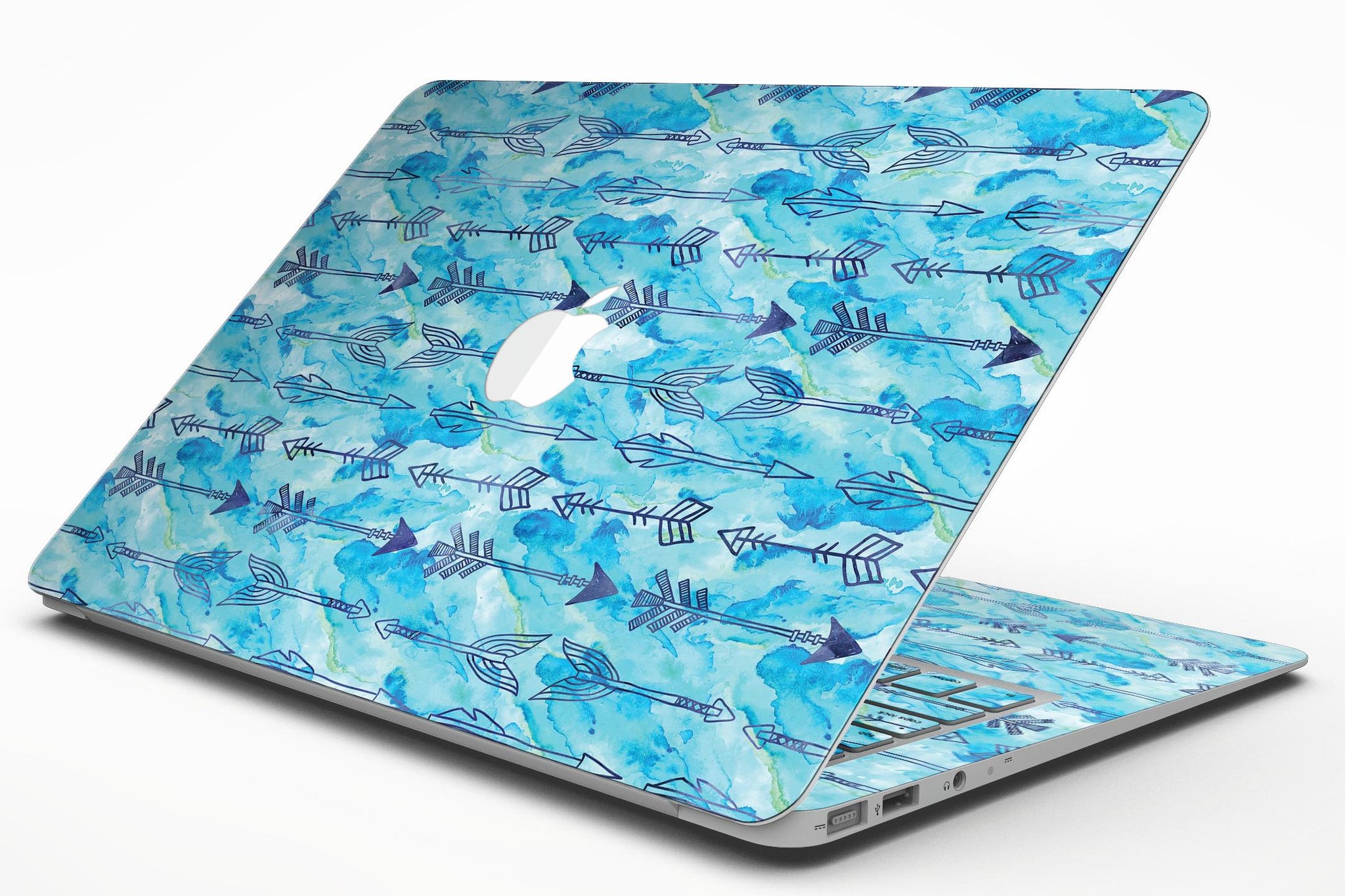 Blue Tribal Arrow Pattern MacBook Air Skin Kit showcasing vibrant tribal design on a sleek vinyl surface.