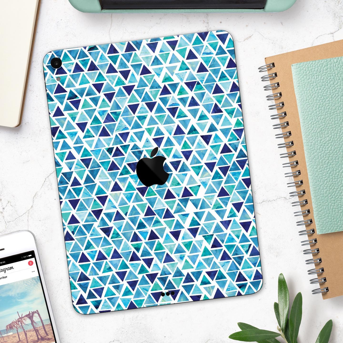 Blue Watercolor Triangle Pattern skin decal for Apple devices, showcasing vibrant colors and a stylish design.