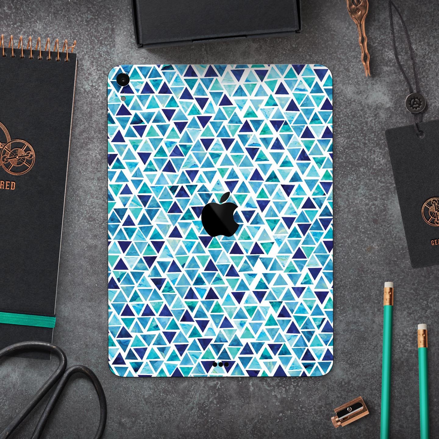 Blue Watercolor Triangle Pattern skin decal for Apple devices, showcasing vibrant colors and a stylish design.