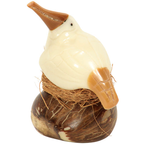 Hand-carved Blue-Footed Booby figurine made from tagua nut, showcasing its intricate details and natural beauty.