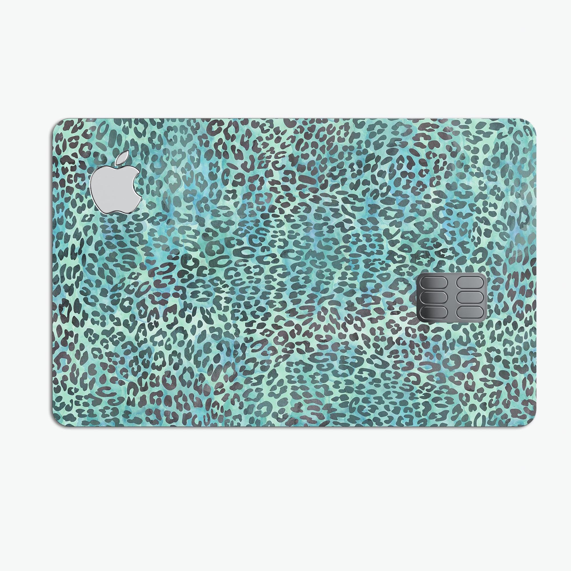 Blue-green watercolor leopard pattern protective decal for Apple Card, showcasing vibrant colors and stylish design.