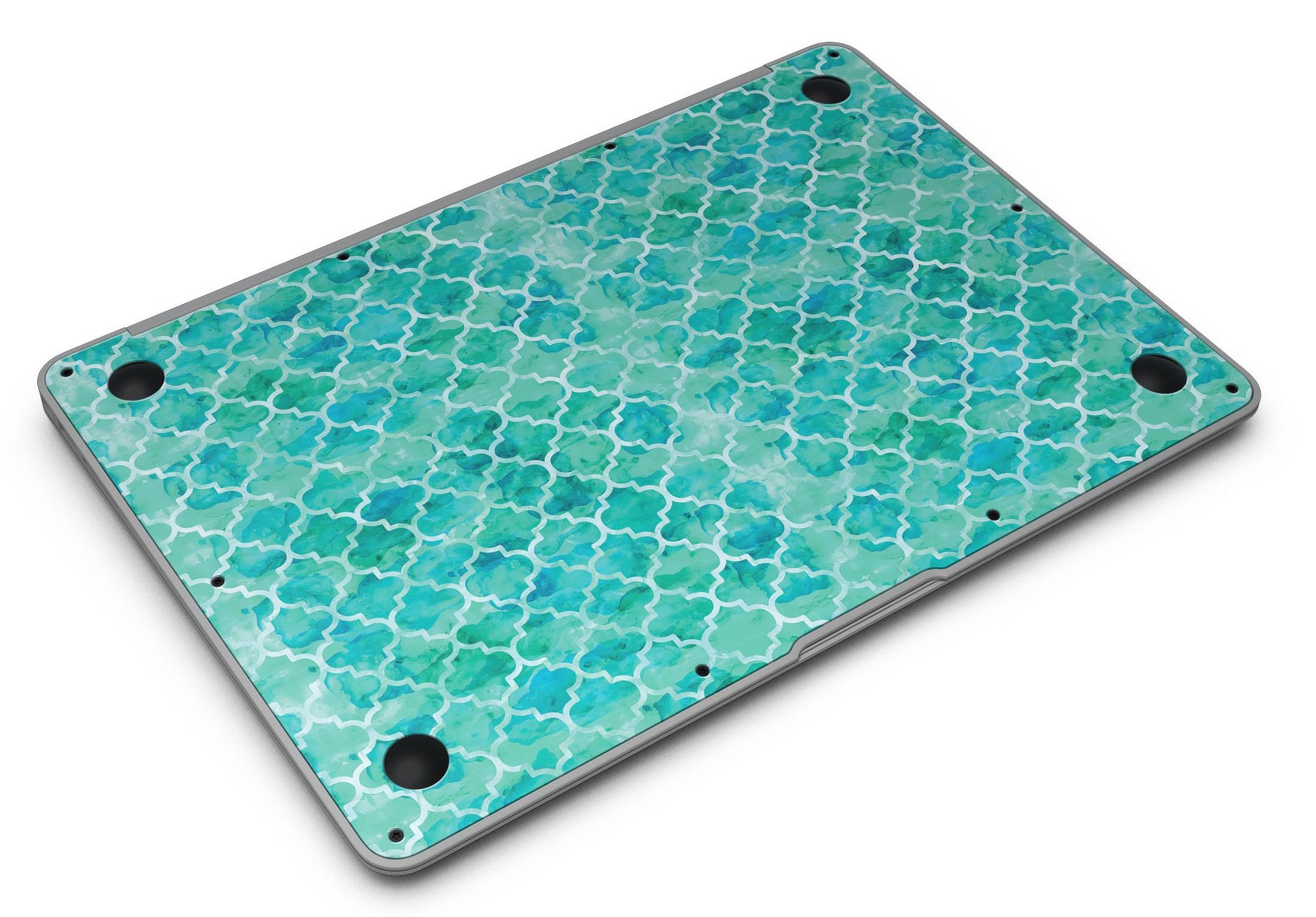 Blue-Green Watercolor Quatrefoil skin applied to a MacBook Air, showcasing its vibrant design and sleek fit.