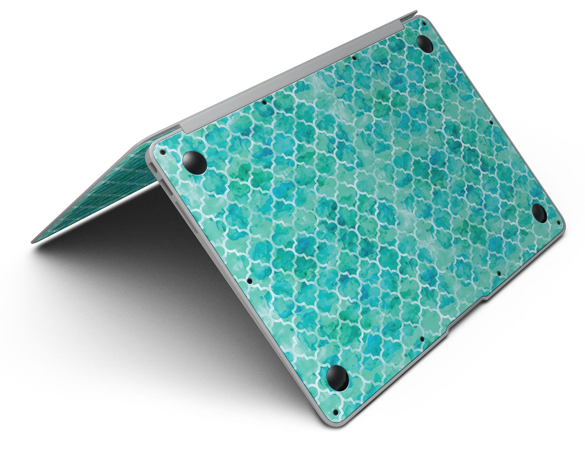 Blue-Green Watercolor Quatrefoil skin applied to a MacBook Air, showcasing its vibrant design and sleek fit.