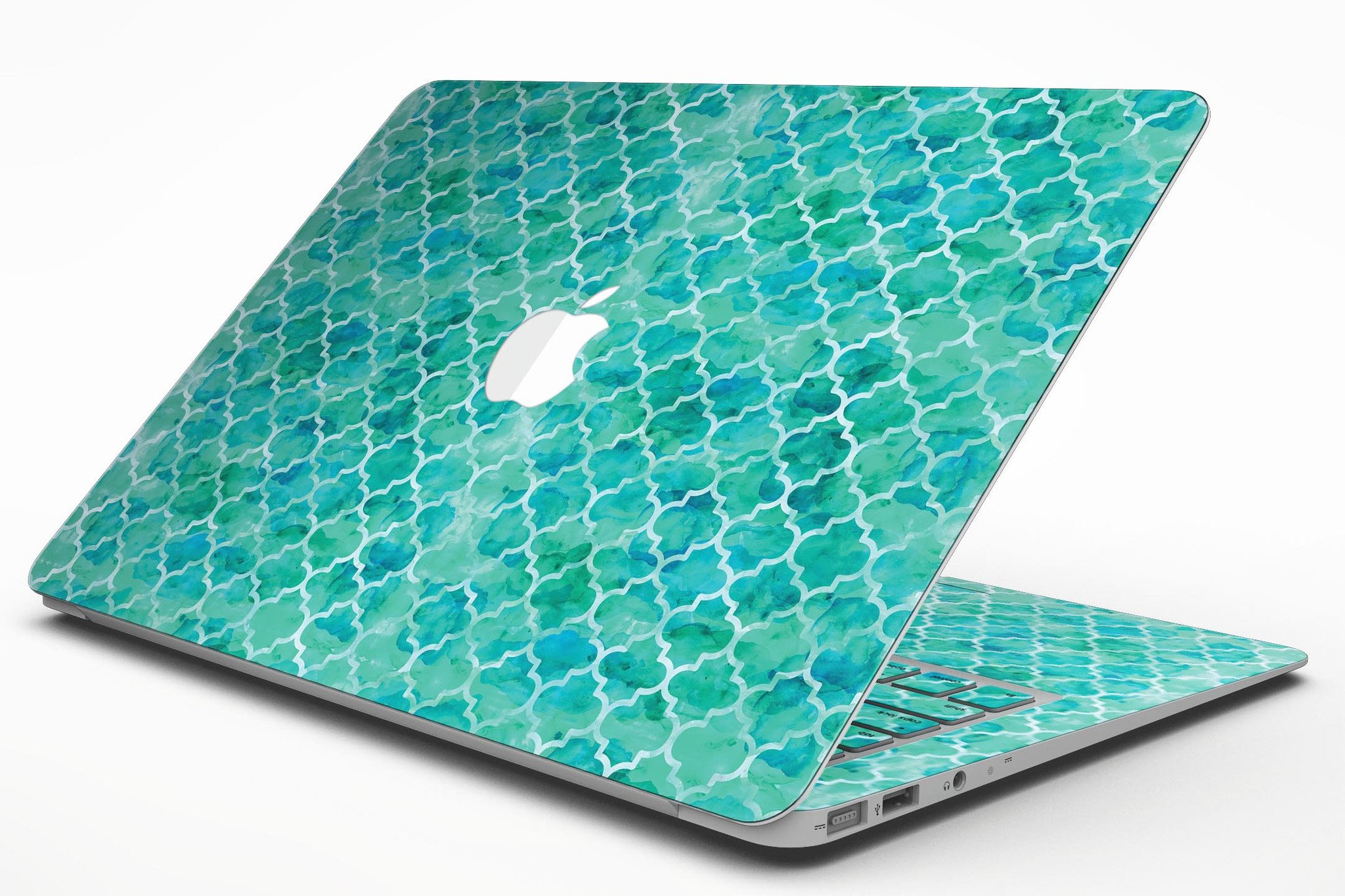 Blue-Green Watercolor Quatrefoil skin applied to a MacBook Air, showcasing its vibrant design and sleek fit.