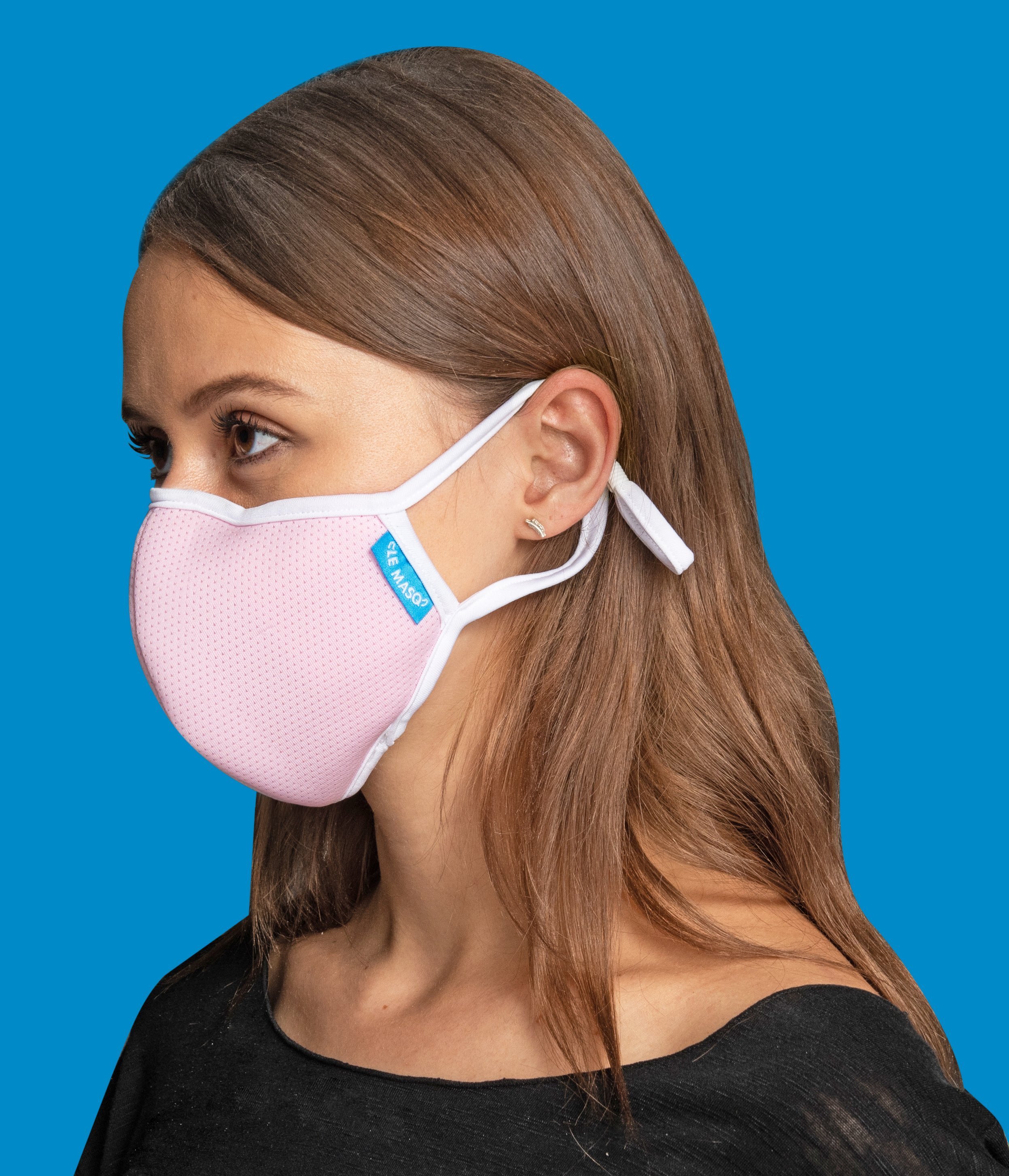 Blush Pink Canvas Mask featuring a breathable design with adjustable ear toggles and a removable inner layer for added comfort.