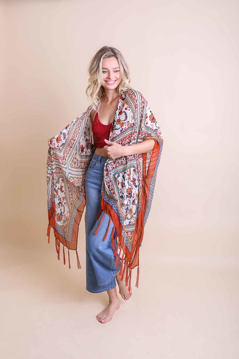 A colorful Bohemian Diamond Tassel Kimono featuring a diamond pattern and tassels, perfect for spring and summer wear.