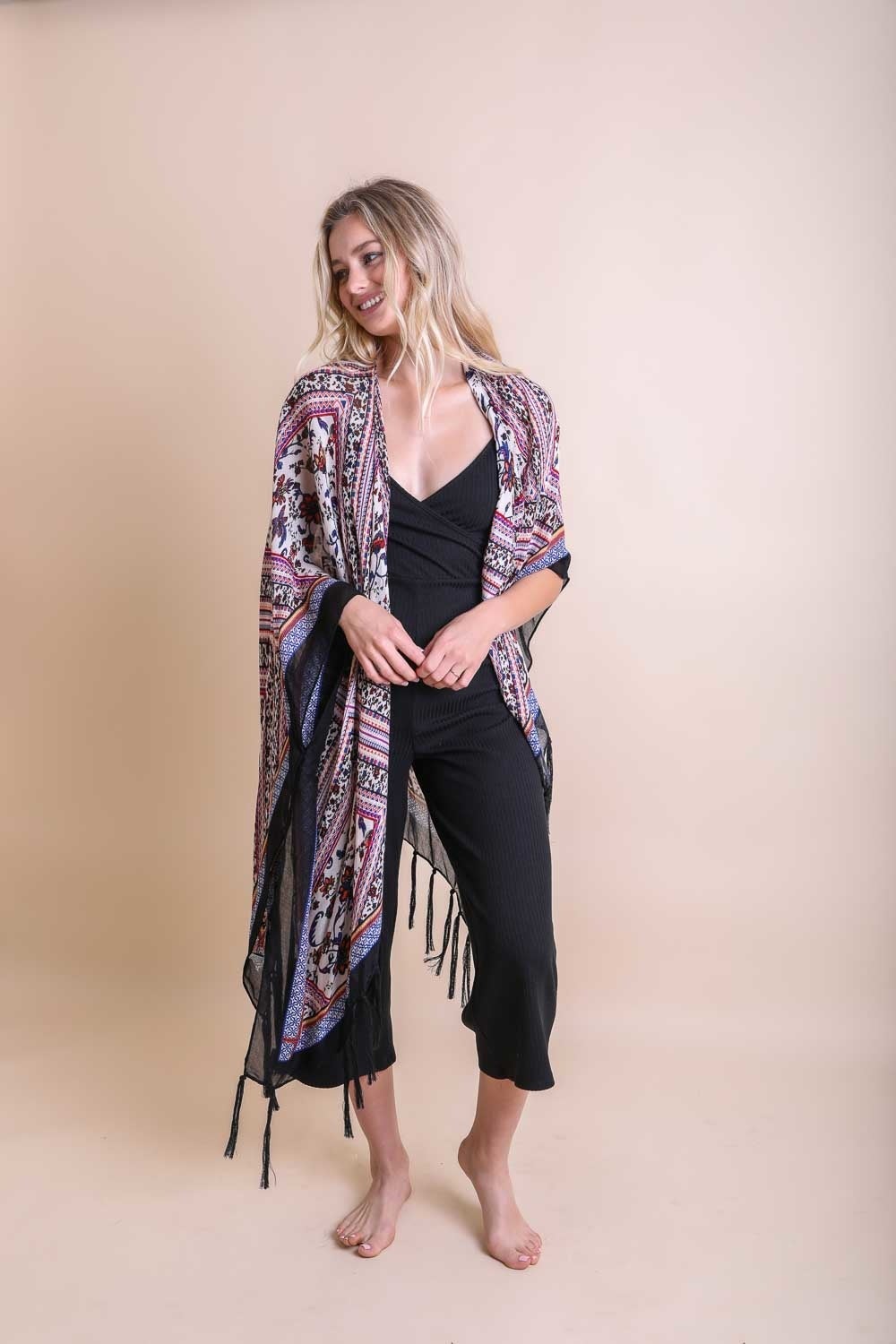 A colorful Bohemian Diamond Tassel Kimono featuring a diamond pattern and tassels, perfect for spring and summer wear.